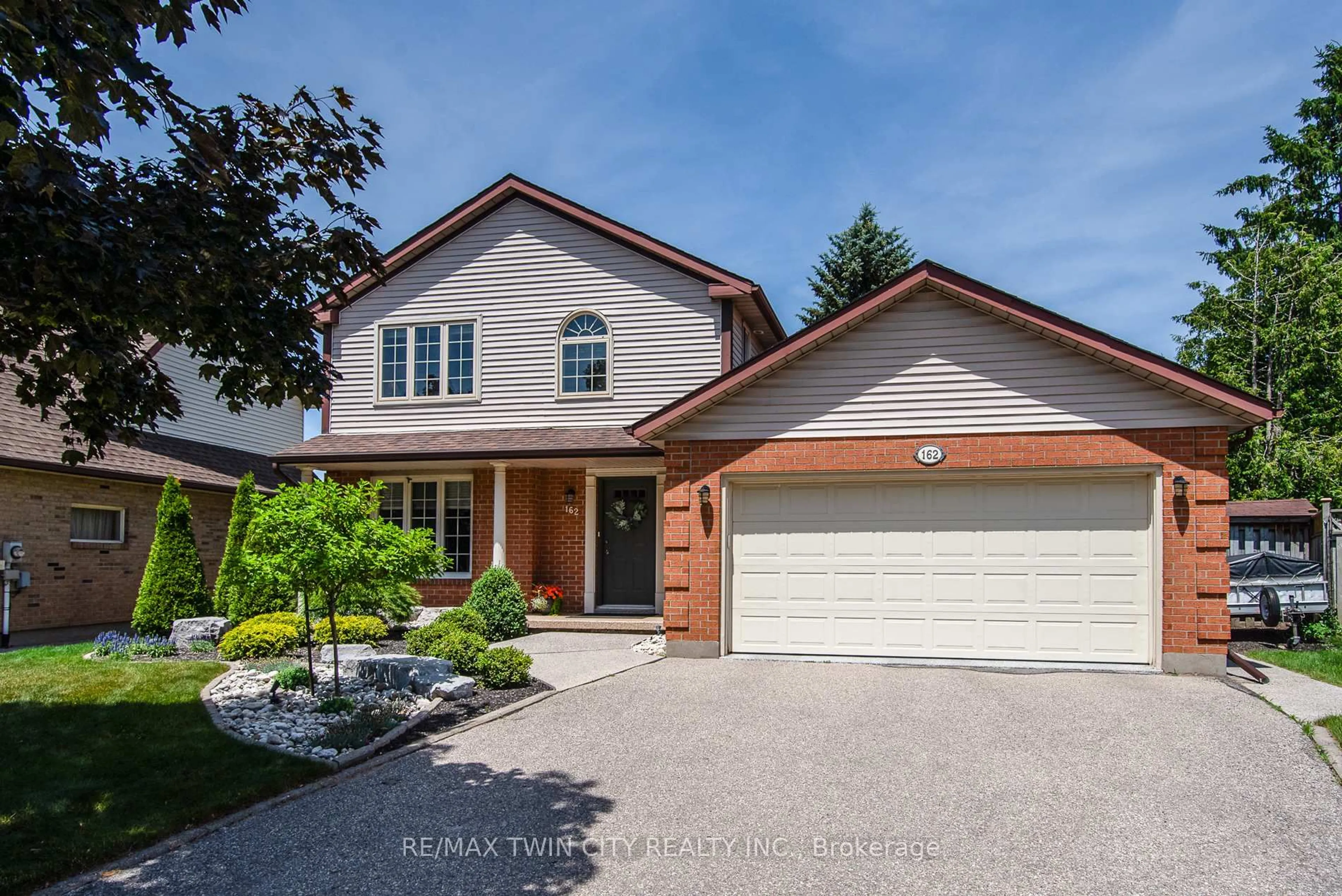Home with brick exterior material, street for 162 Ambleside Crt, Waterloo Ontario N2K 3E4