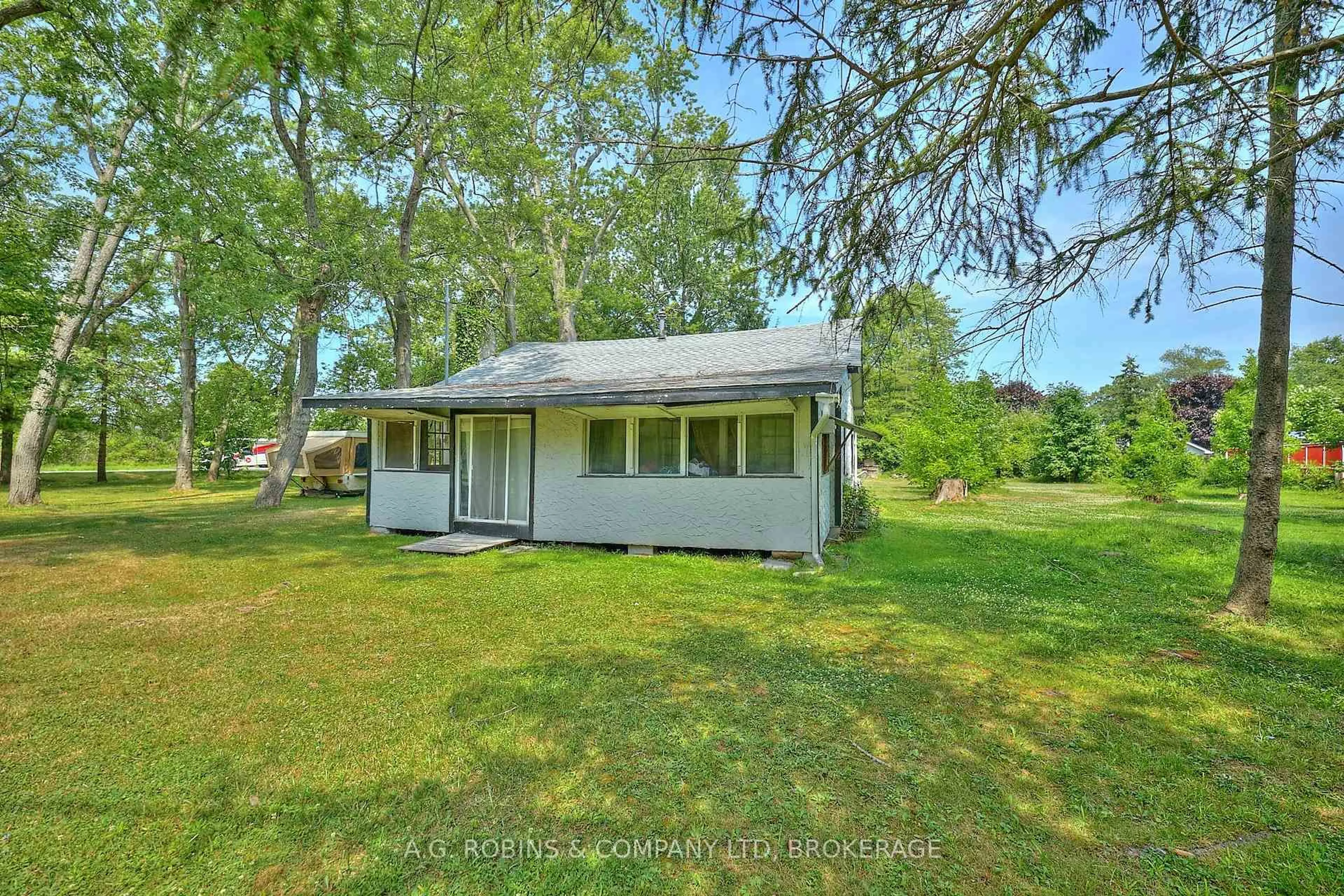 A pic from outside/outdoor area/front of a property/back of a property/a pic from drone, water/lake/river/ocean view for 10598 Woodland Dr, Wainfleet Ontario L0S 1V0