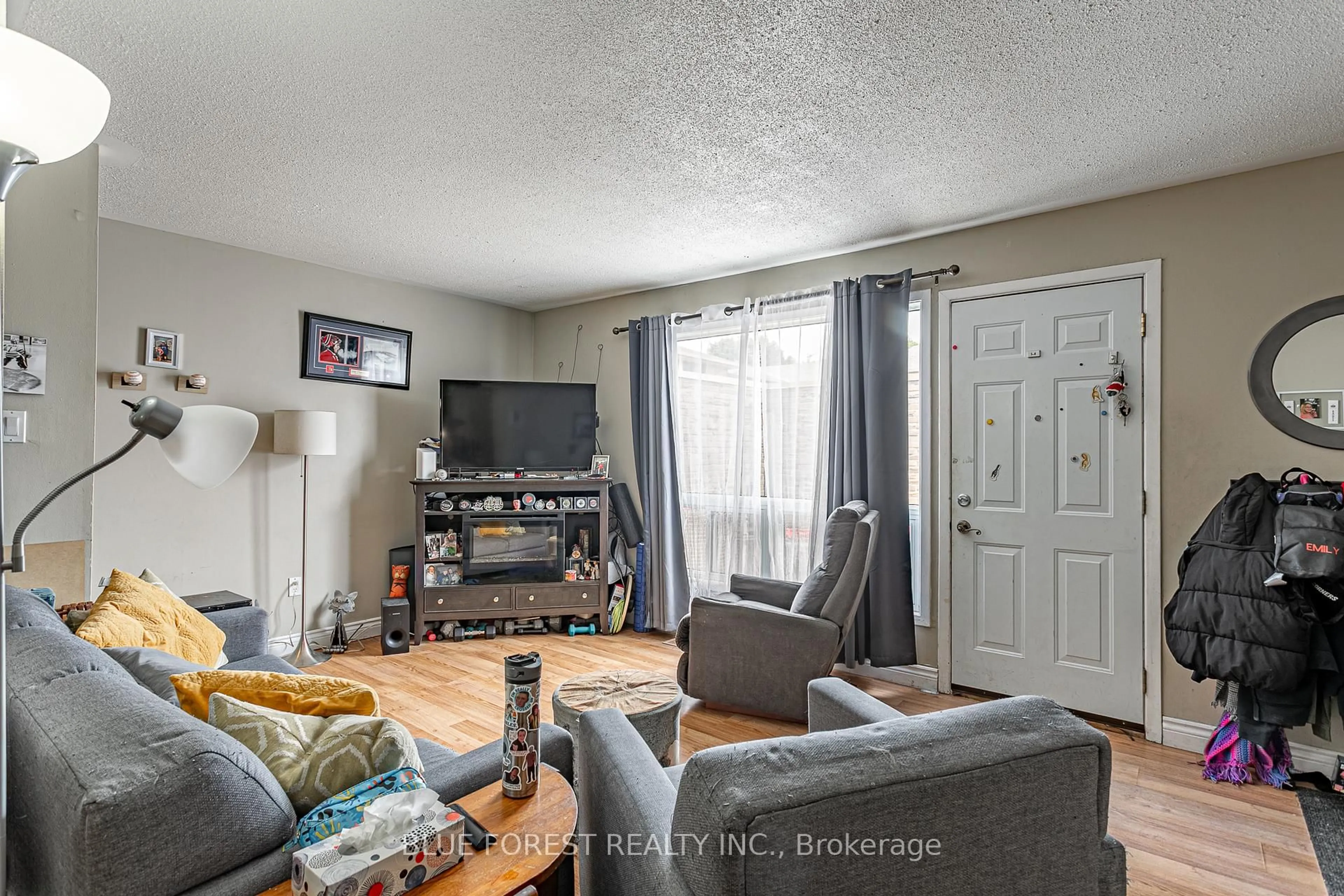 Living room with furniture, unknown for 474 Southdale Rd #26, London South Ontario N6E 1E4