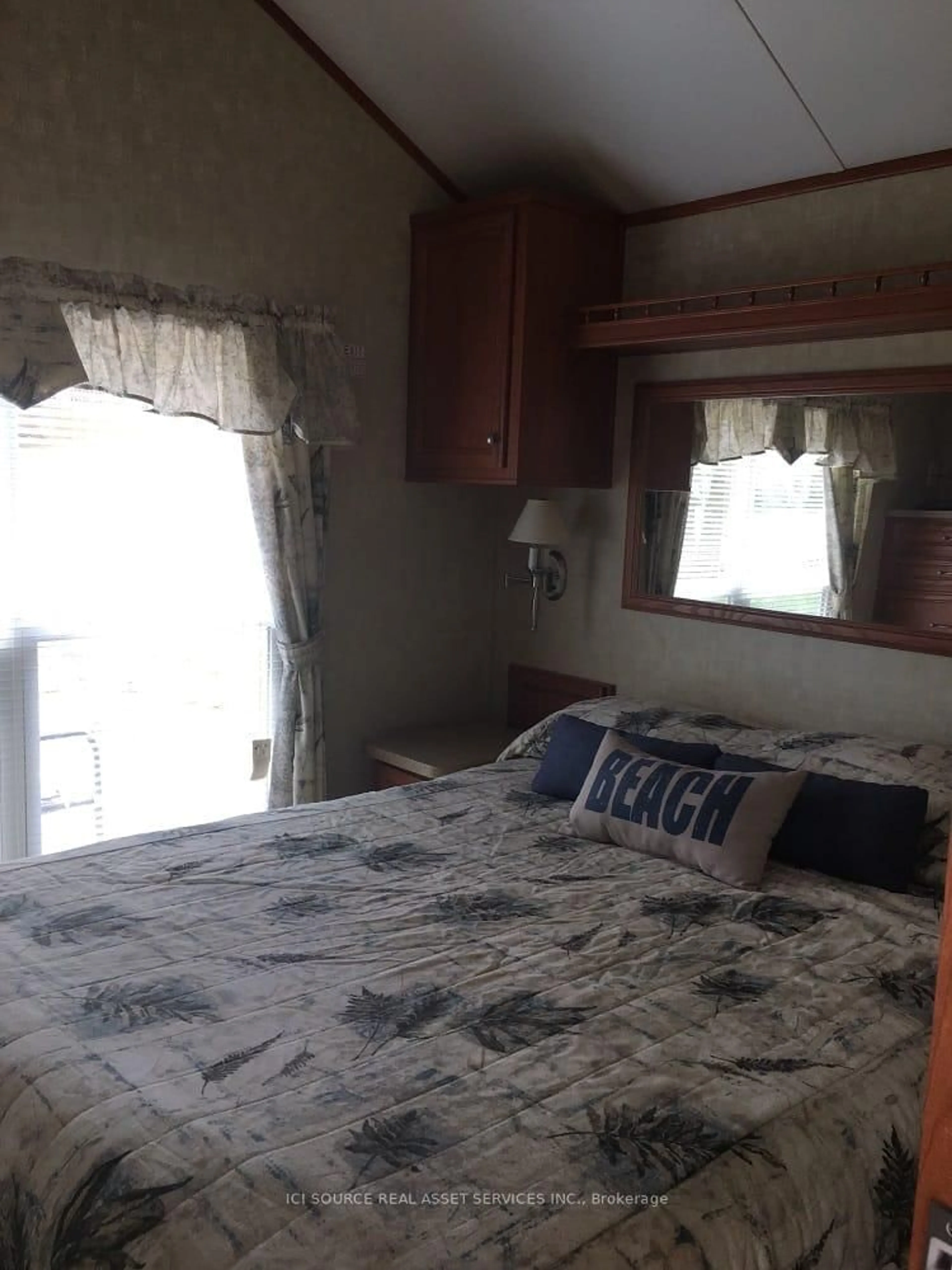 Bedroom with bed, floor is not visible for 486 County Road 18 #BSL03, Prince Edward County Ontario K0K 1P0