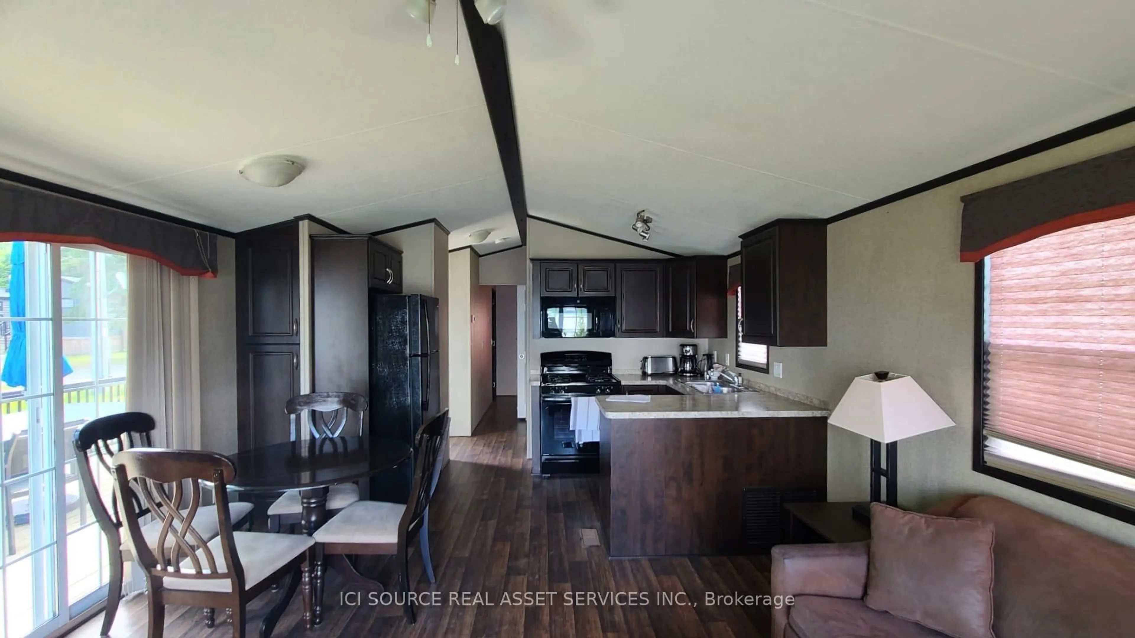 Open concept kitchen, wood/laminate floor for 7100 County Rd 18 #SBR03, Alnwick/Haldimand Ontario K0K 2X0