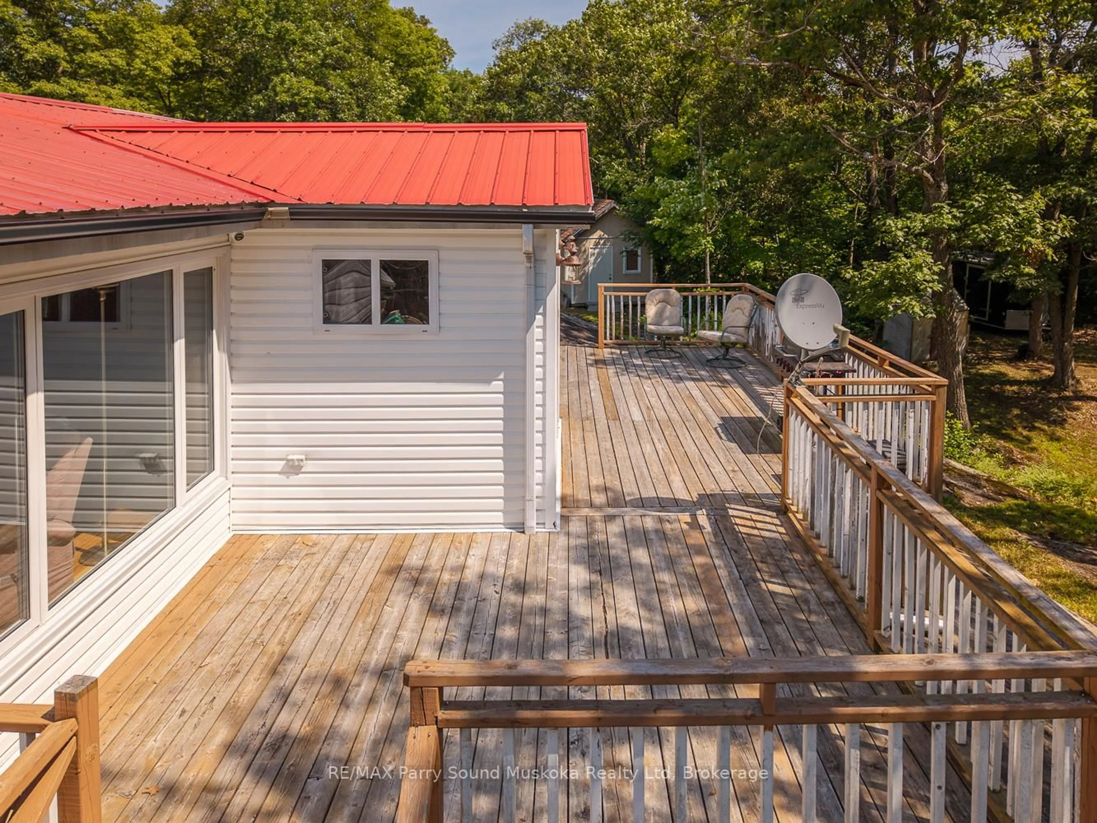 A pic from outside/outdoor area/front of a property/back of a property/a pic from drone, water/lake/river/ocean view for 124 Pinewood Rd, McDougall Ontario P2A 2W9