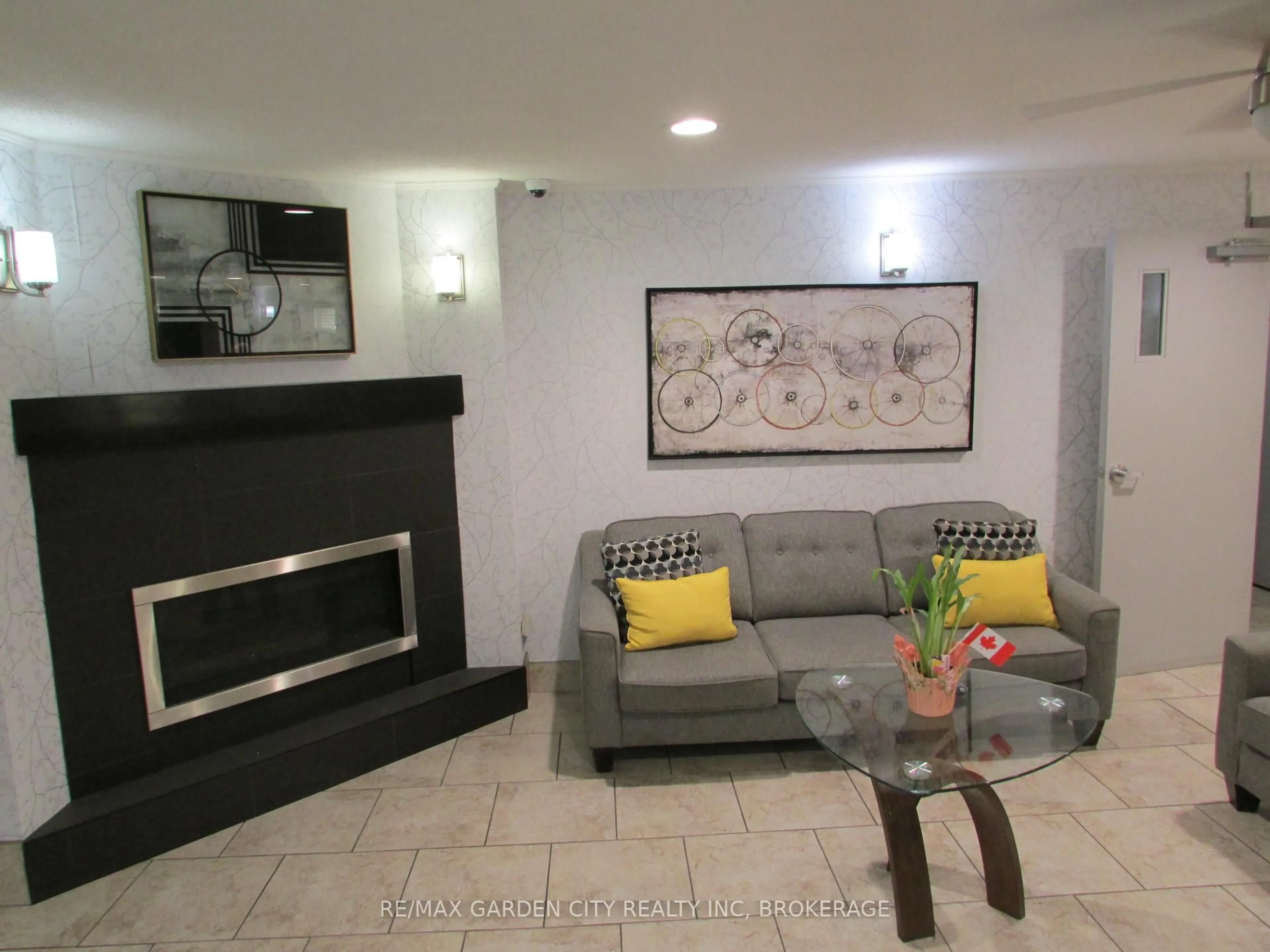 Living room with furniture, unknown for 198 Scott St #215, St. Catharines Ontario L2N 5T3