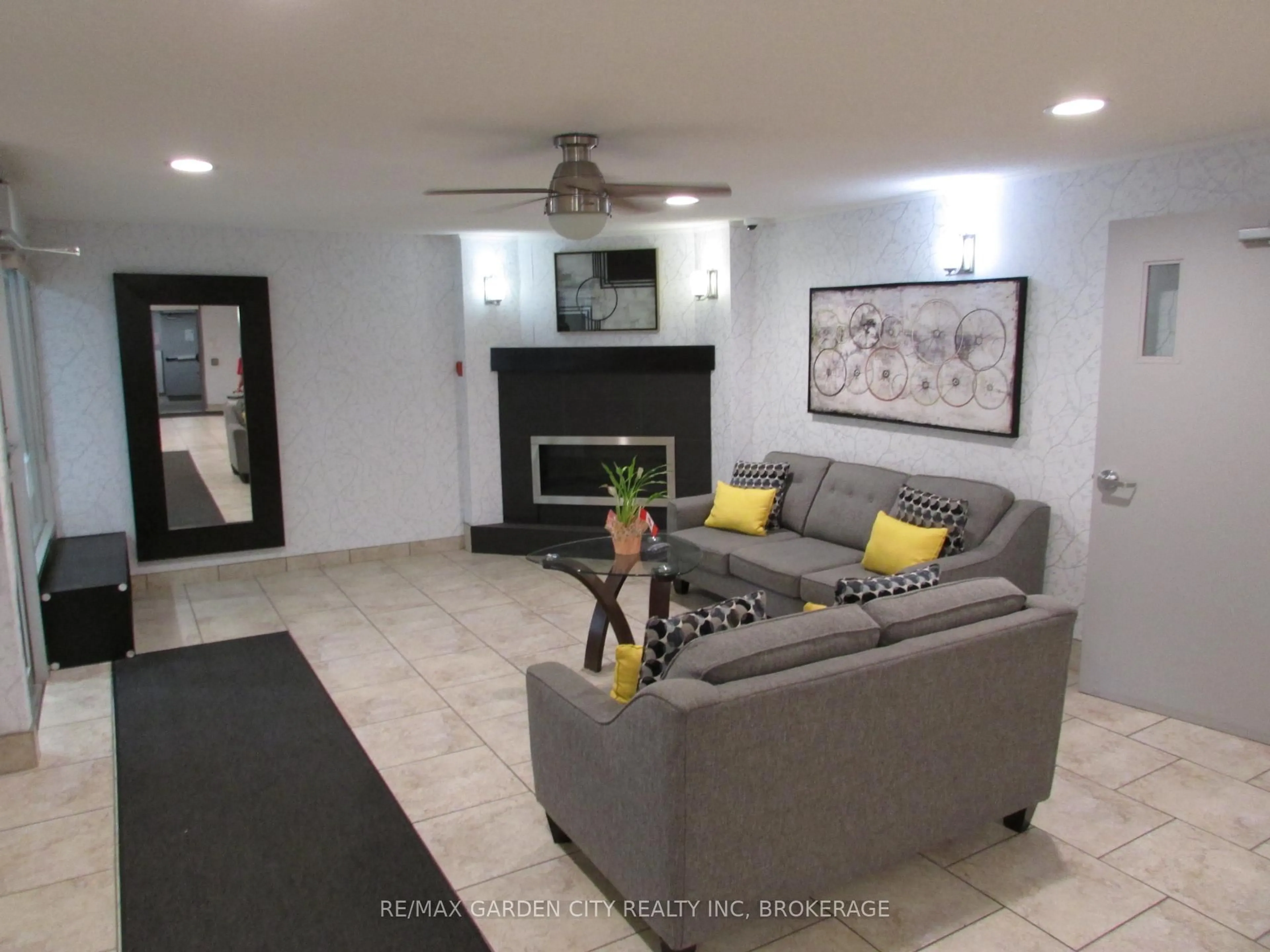 Living room with furniture, unknown for 198 Scott St #215, St. Catharines Ontario L2N 5T3
