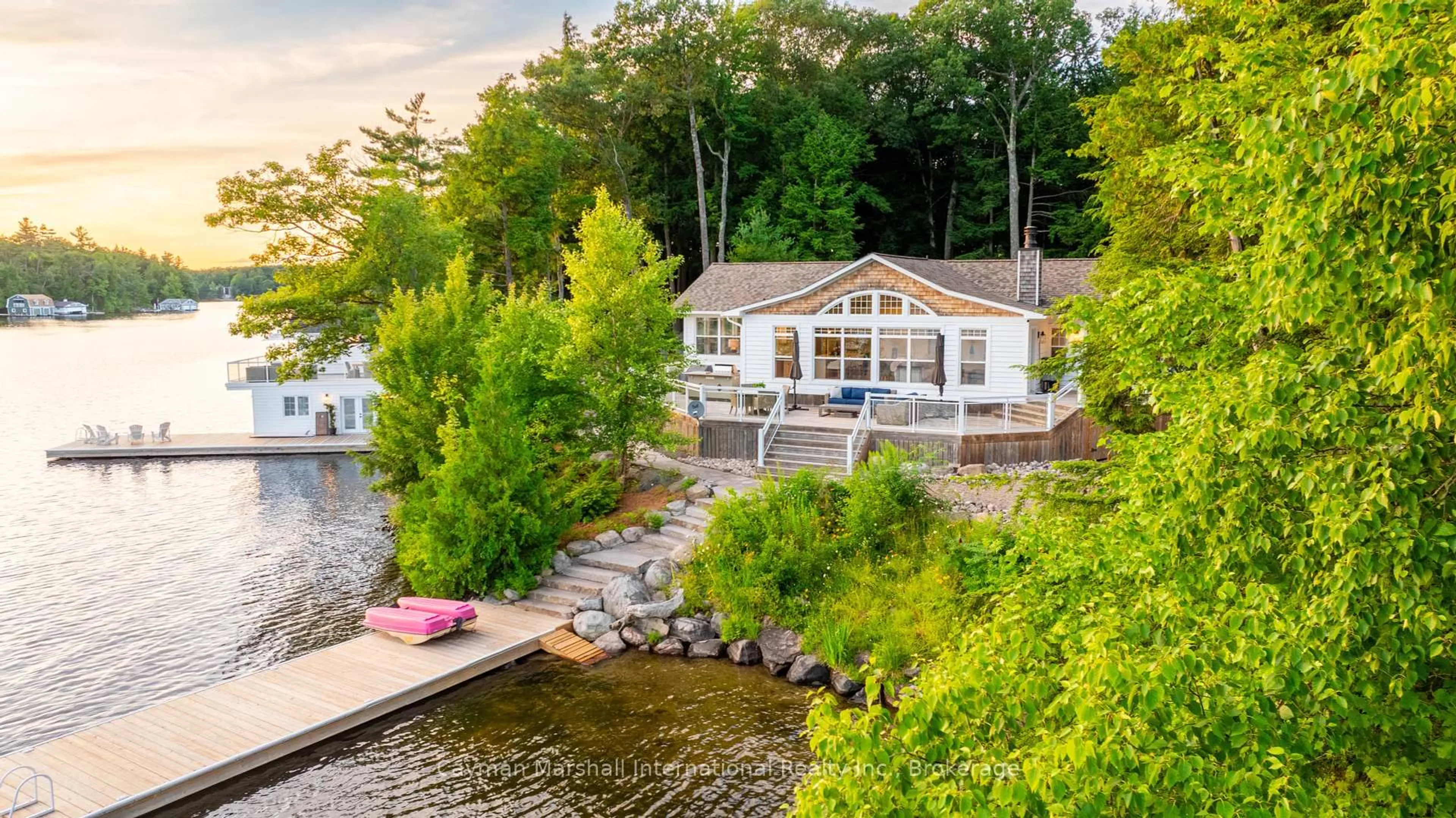 A pic from outside/outdoor area/front of a property/back of a property/a pic from drone, water/lake/river/ocean view for 21 Muskodasa Island, Muskoka Lakes Ontario P0B 1J0