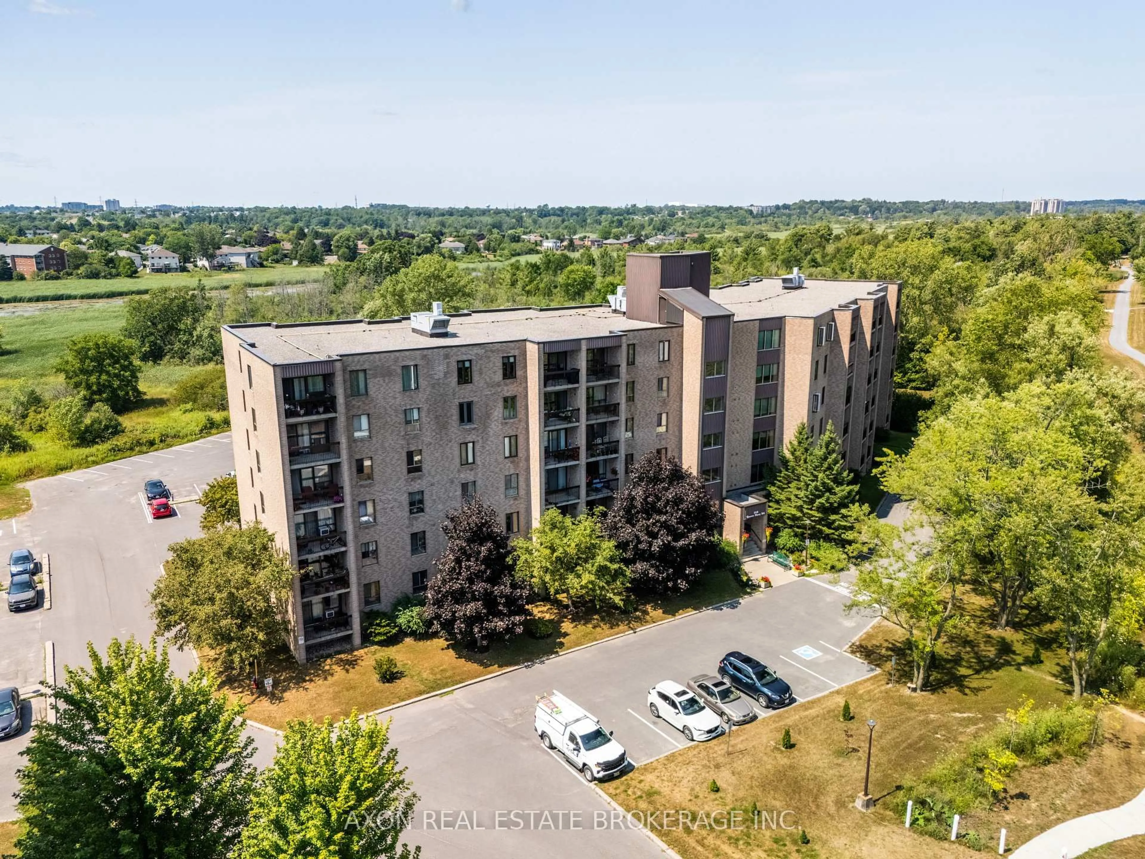 A pic from outside/outdoor area/front of a property/back of a property/a pic from drone, unknown for 358 Queen Mary Rd #501, Kingston Ontario K7M 7E8