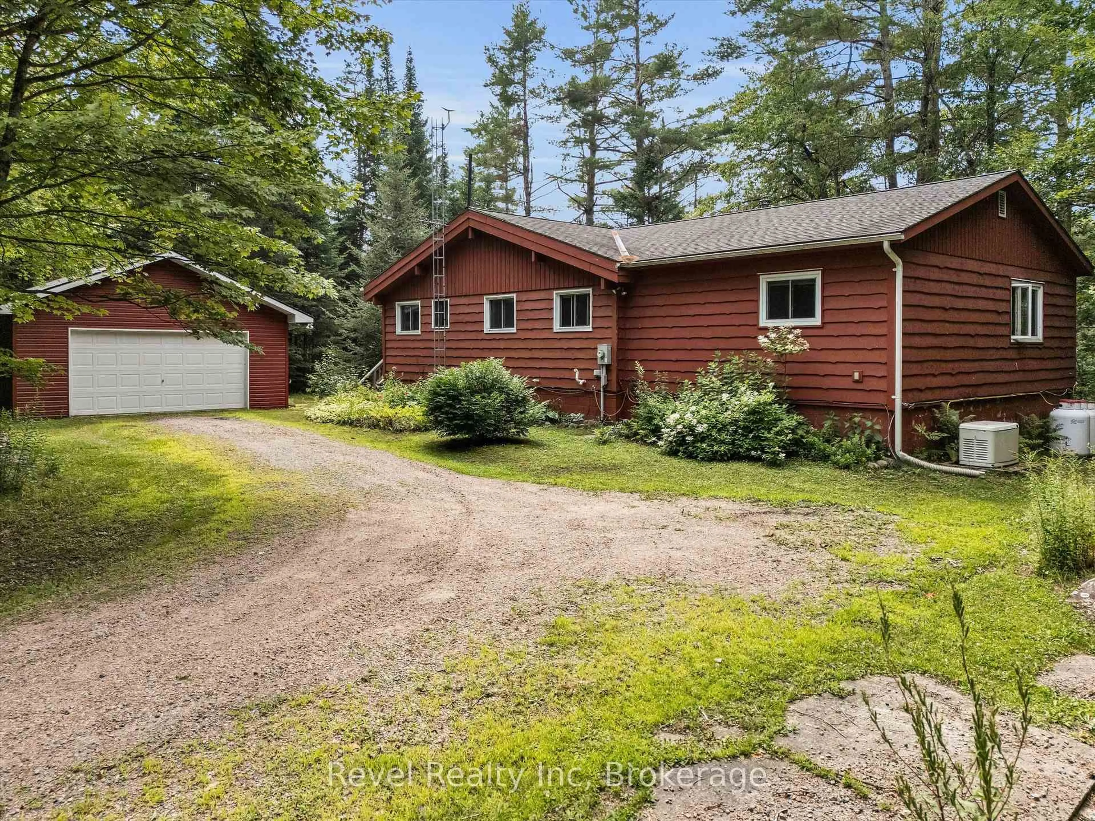 A pic from outside/outdoor area/front of a property/back of a property/a pic from drone, forest/trees view for 1234 Miriam Dr, Bracebridge Ontario P1L 1X1