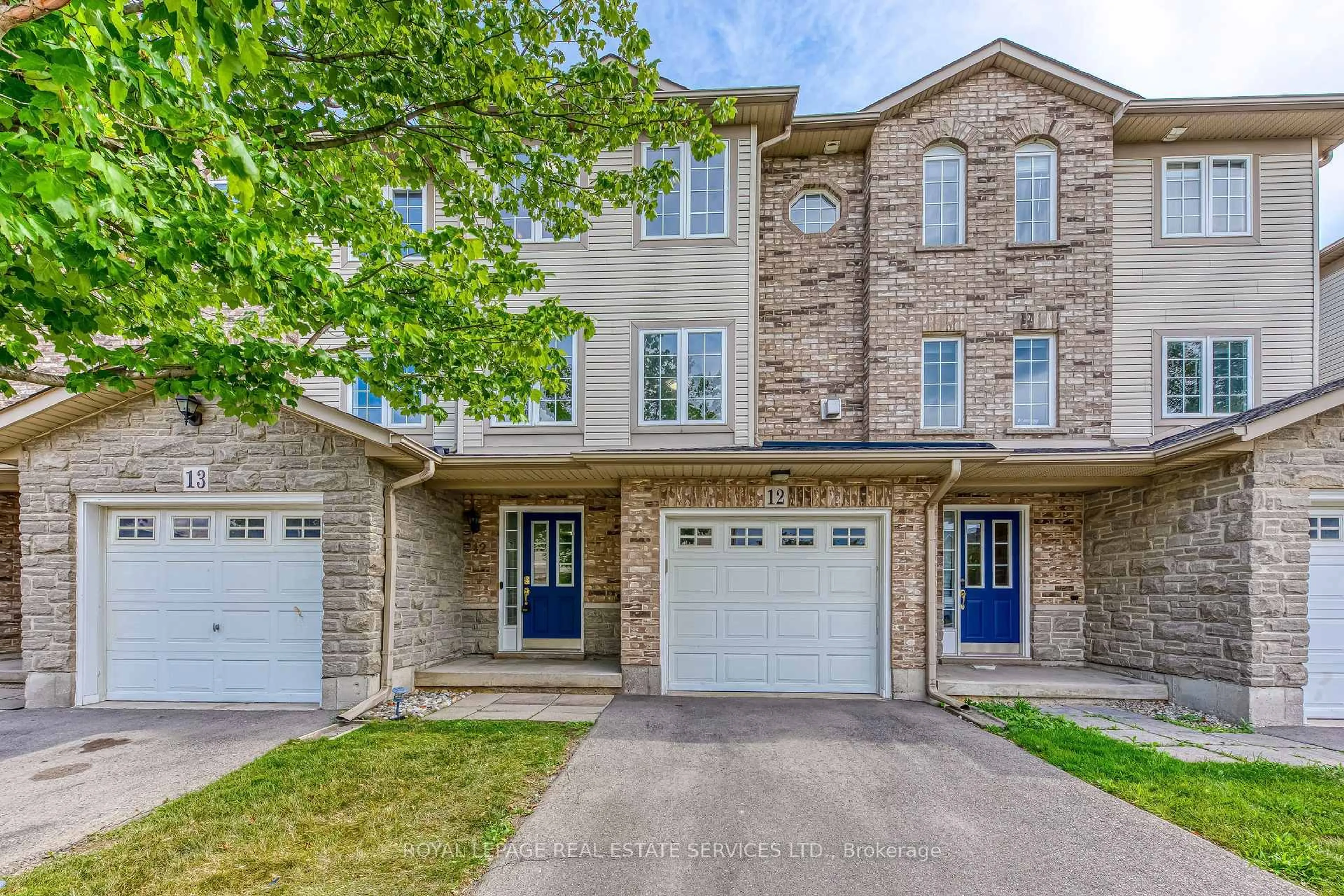 Home with brick exterior material, street for 7 Southside Pl #12, Hamilton Ontario L9C 7W6