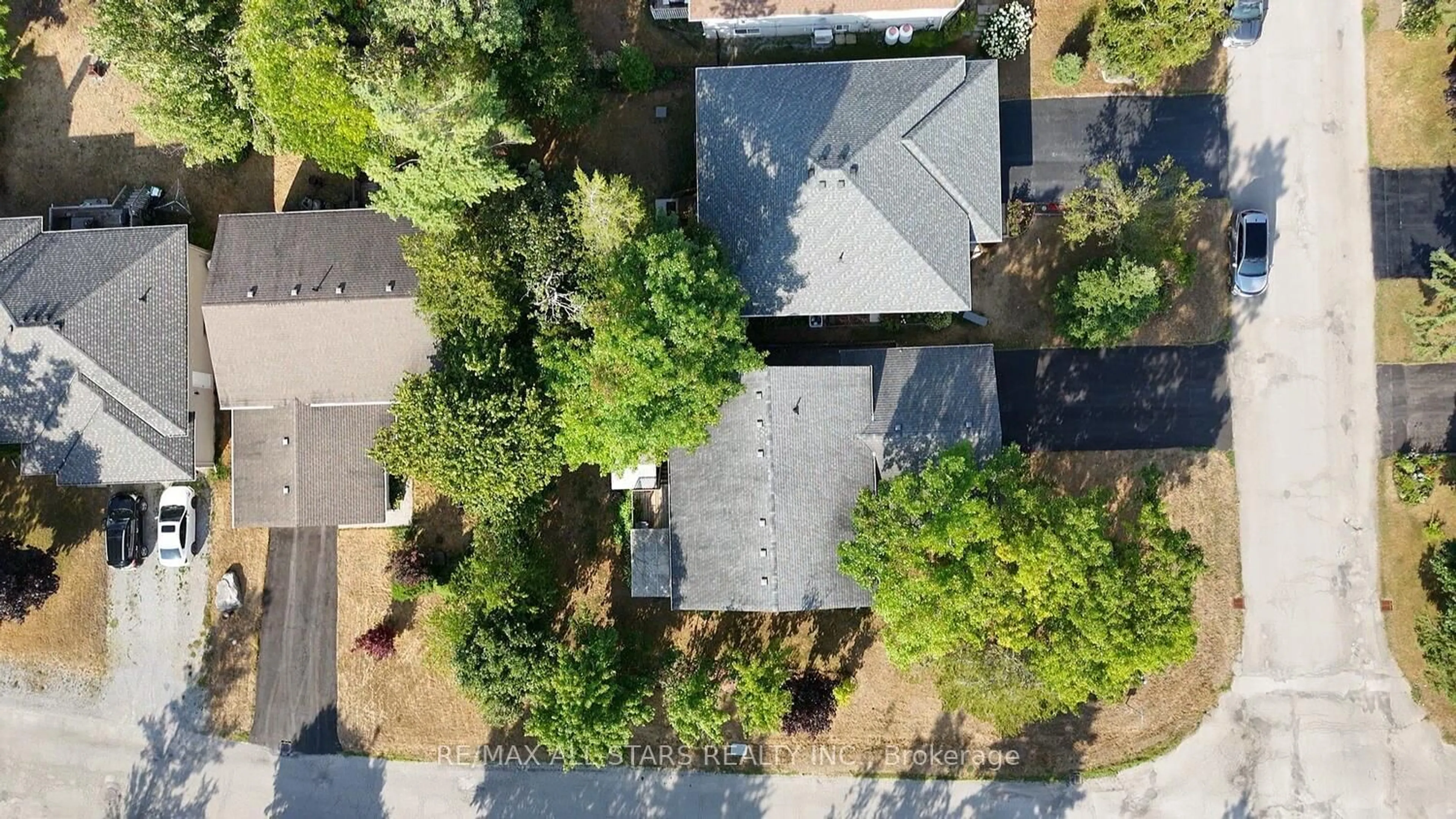 A pic from outside/outdoor area/front of a property/back of a property/a pic from drone, street for 47 Cedartree Lane, Kawartha Lakes Ontario K0M 1A0
