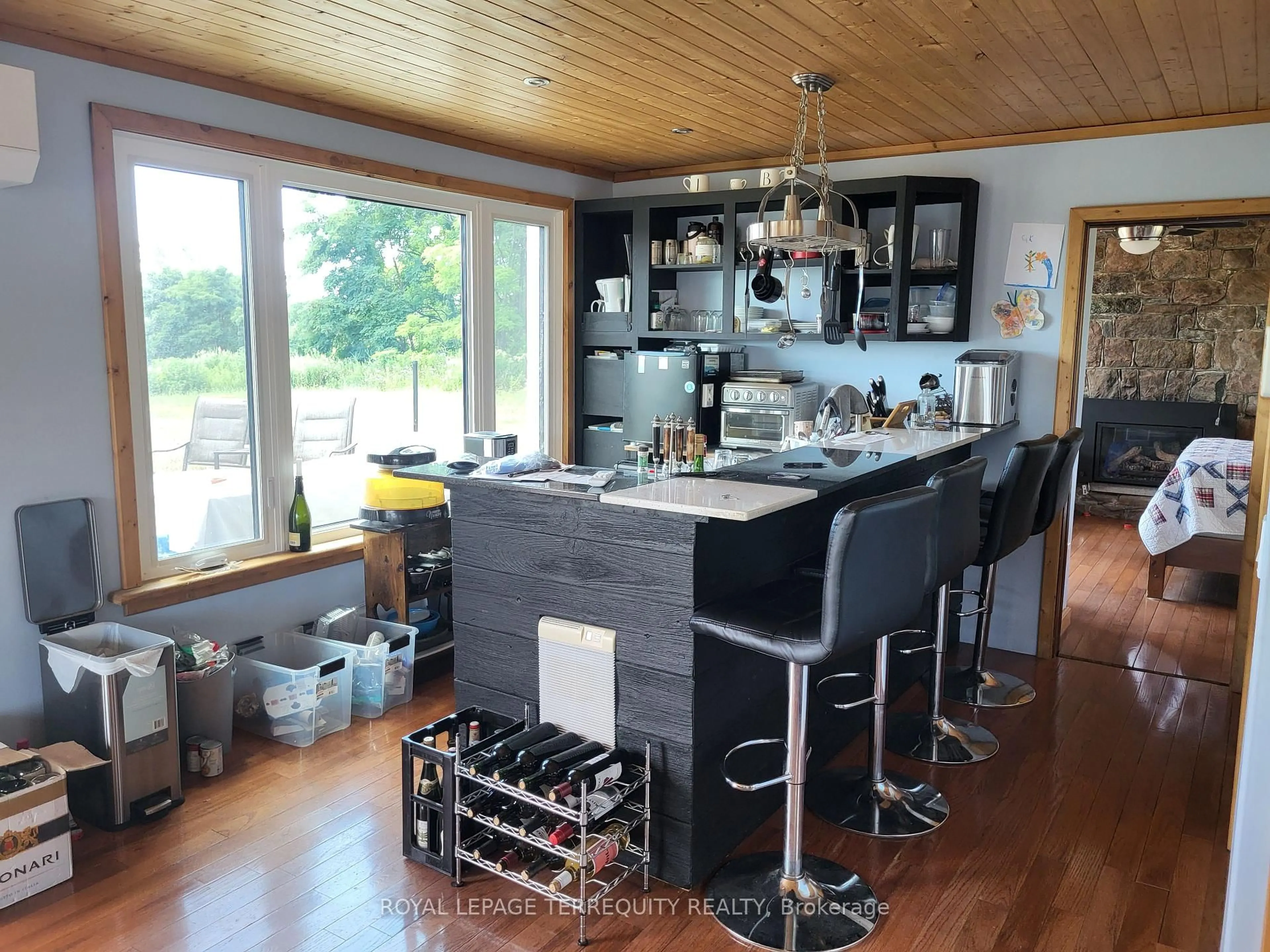 Open concept kitchen, wood/laminate floor for 14407 County Road 2, Brighton Ontario K0K 1H0