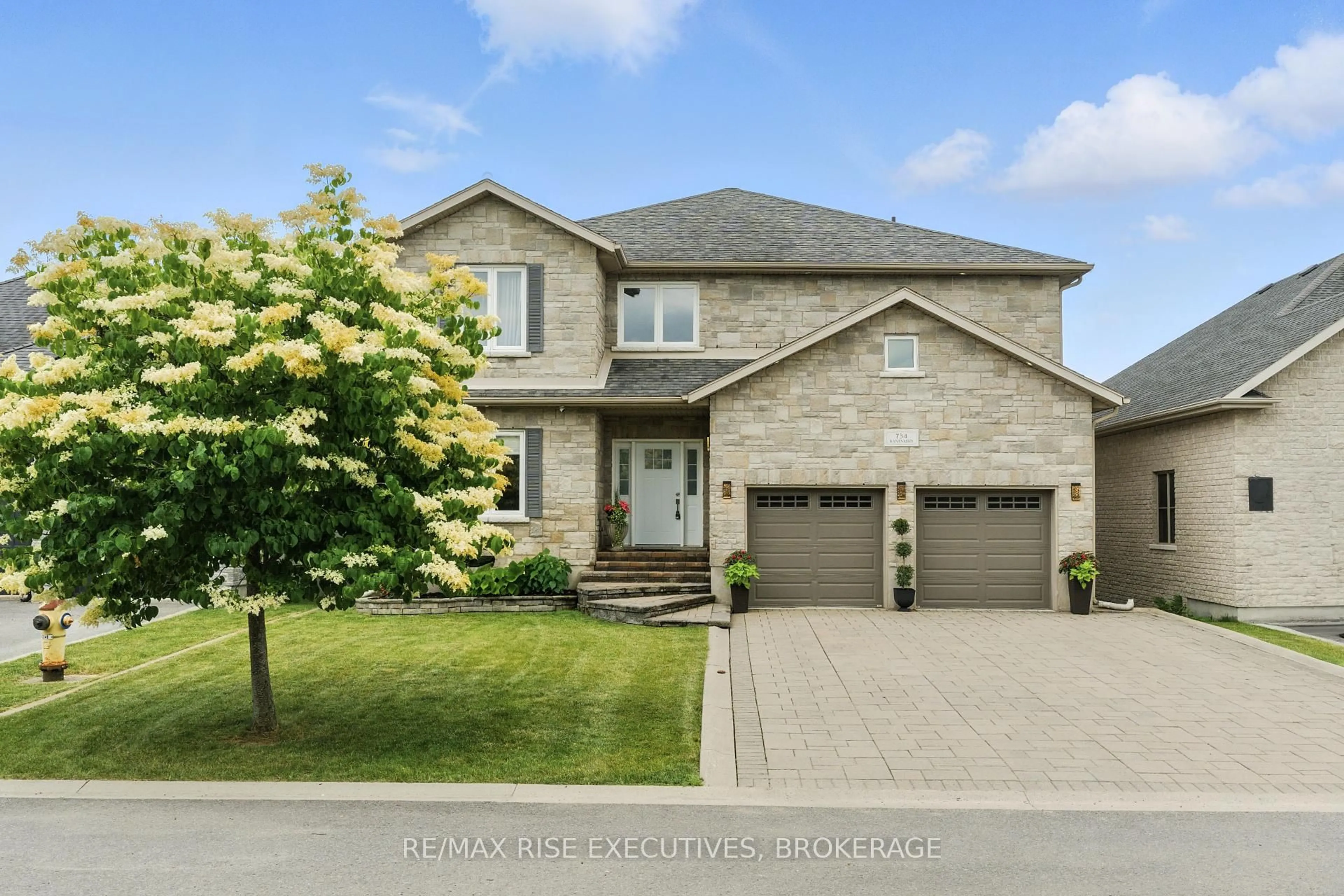 Home with brick exterior material, street for 734 Kananaskis Dr, Kingston Ontario K7P 0A9