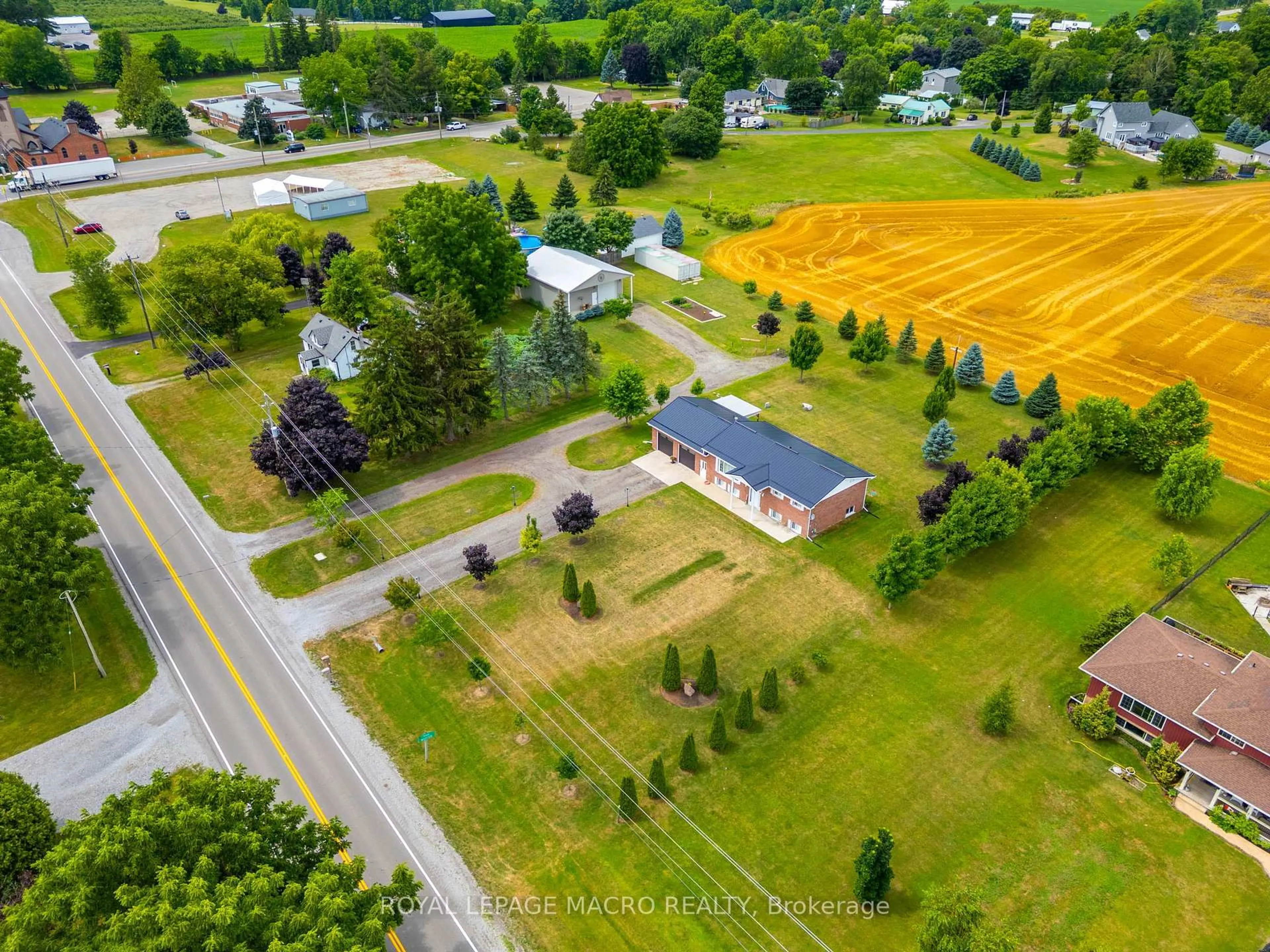 A pic from outside/outdoor area/front of a property/back of a property/a pic from drone, street for 991 Norfolk County Rd 19 E, Norfolk Ontario N0E 1Z0