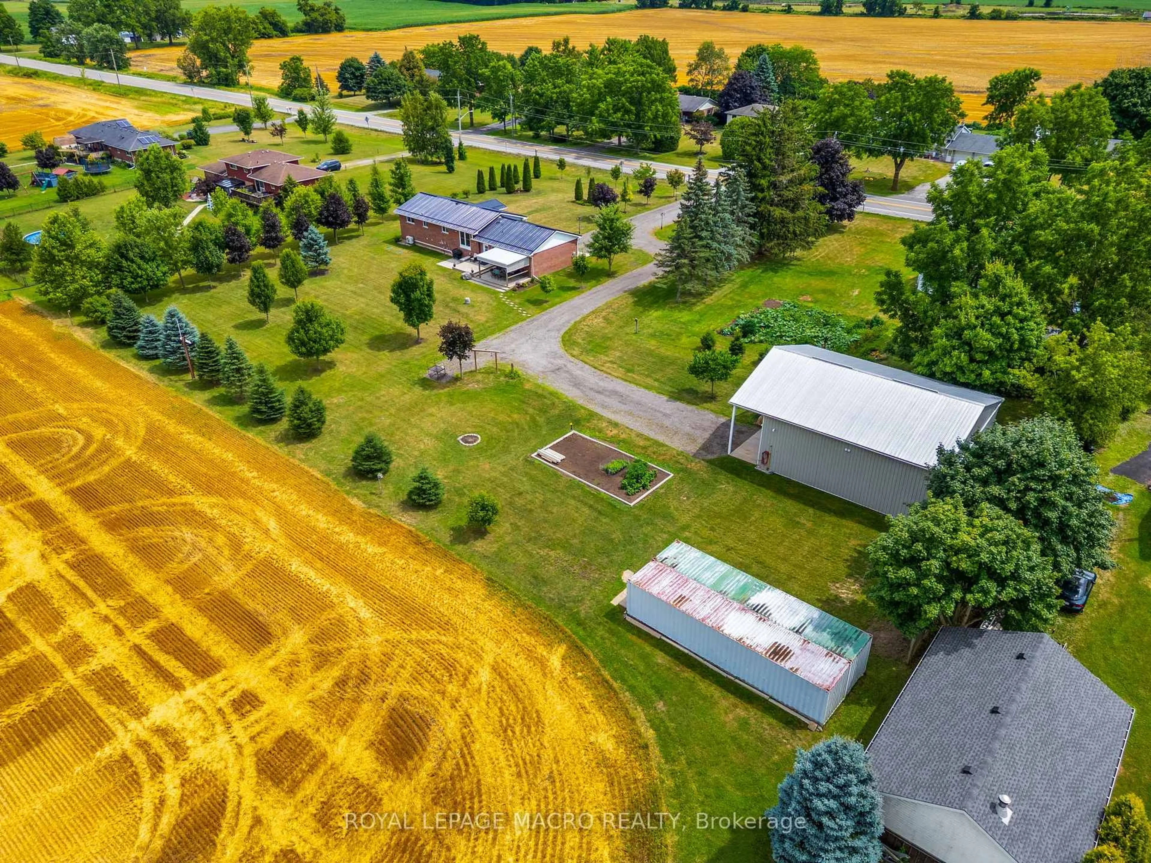 A pic from outside/outdoor area/front of a property/back of a property/a pic from drone, street for 991 Norfolk County Rd 19 E, Norfolk Ontario N0E 1Z0