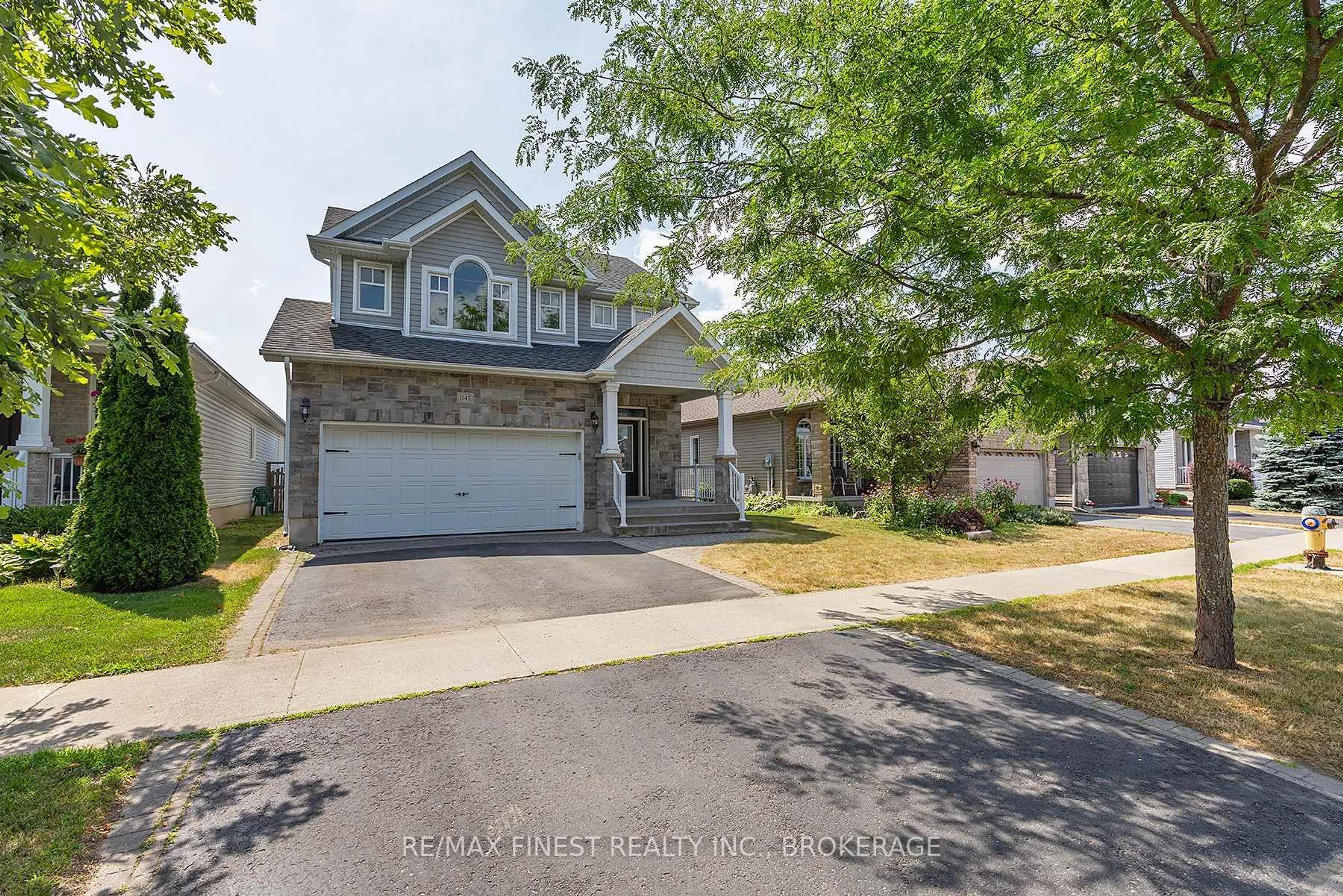 Home with vinyl exterior material, street for 1145 Crossfield Ave, Kingston Ontario K7P 0G5