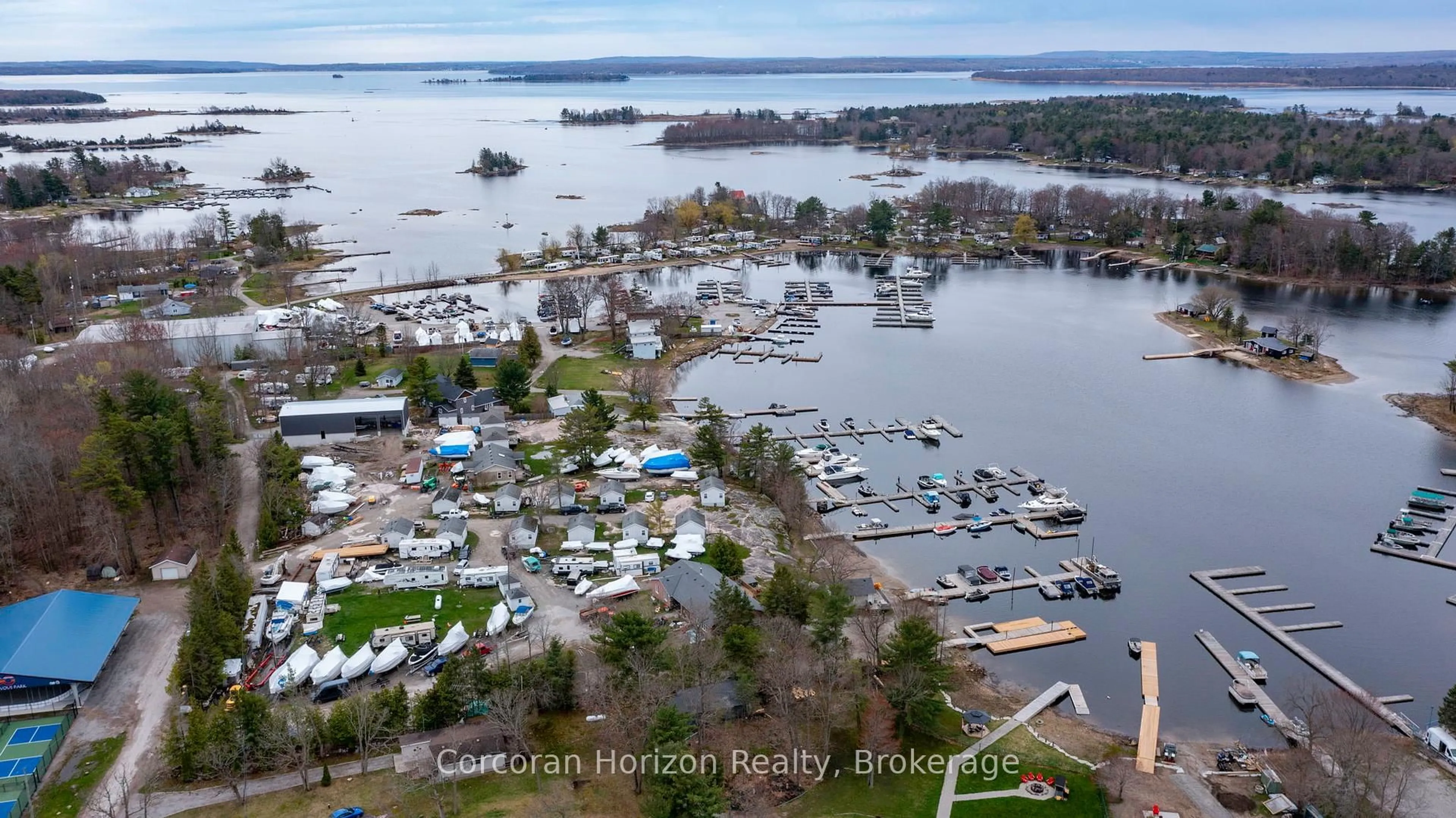 A pic from outside/outdoor area/front of a property/back of a property/a pic from drone, water/lake/river/ocean view for 2517 HONEY HARBOUR Rd, Georgian Bay Ontario L0K 1S0