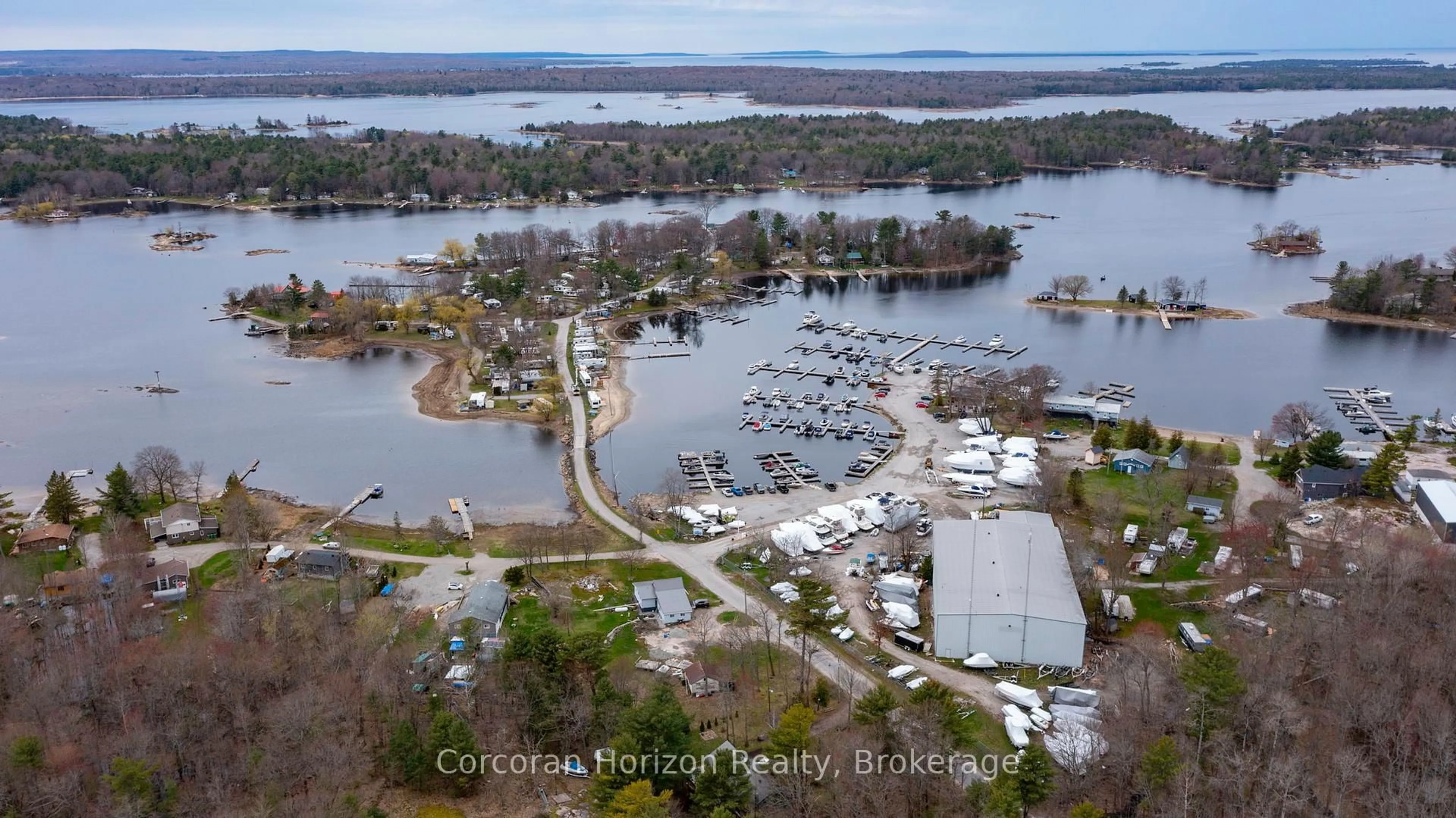 A pic from outside/outdoor area/front of a property/back of a property/a pic from drone, water/lake/river/ocean view for 2517 HONEY HARBOUR Rd, Georgian Bay Ontario L0K 1S0