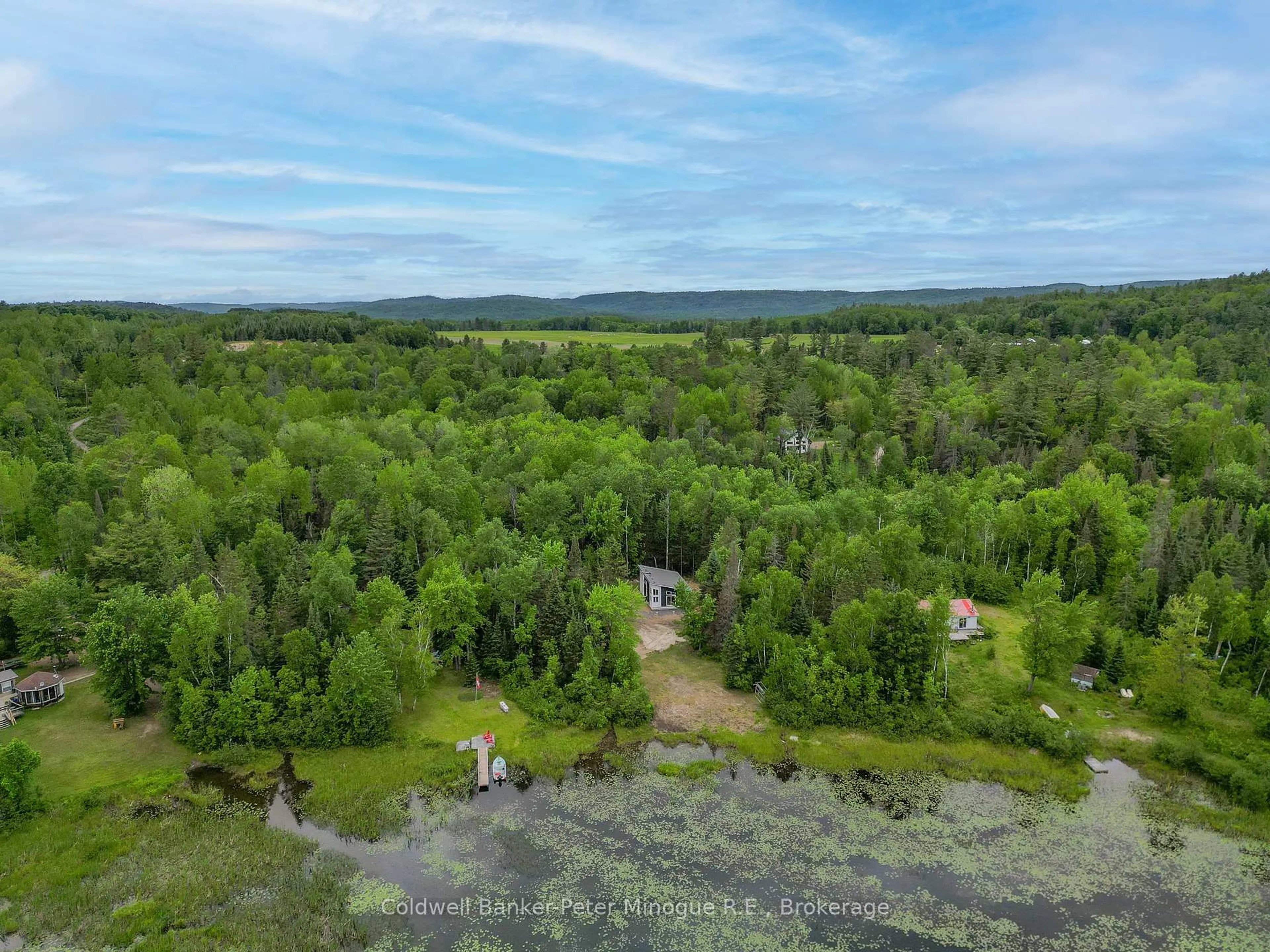A pic from outside/outdoor area/front of a property/back of a property/a pic from drone, water/lake/river/ocean view for 30 Shields Point Rd, Bonfield Ontario P0H 2E0
