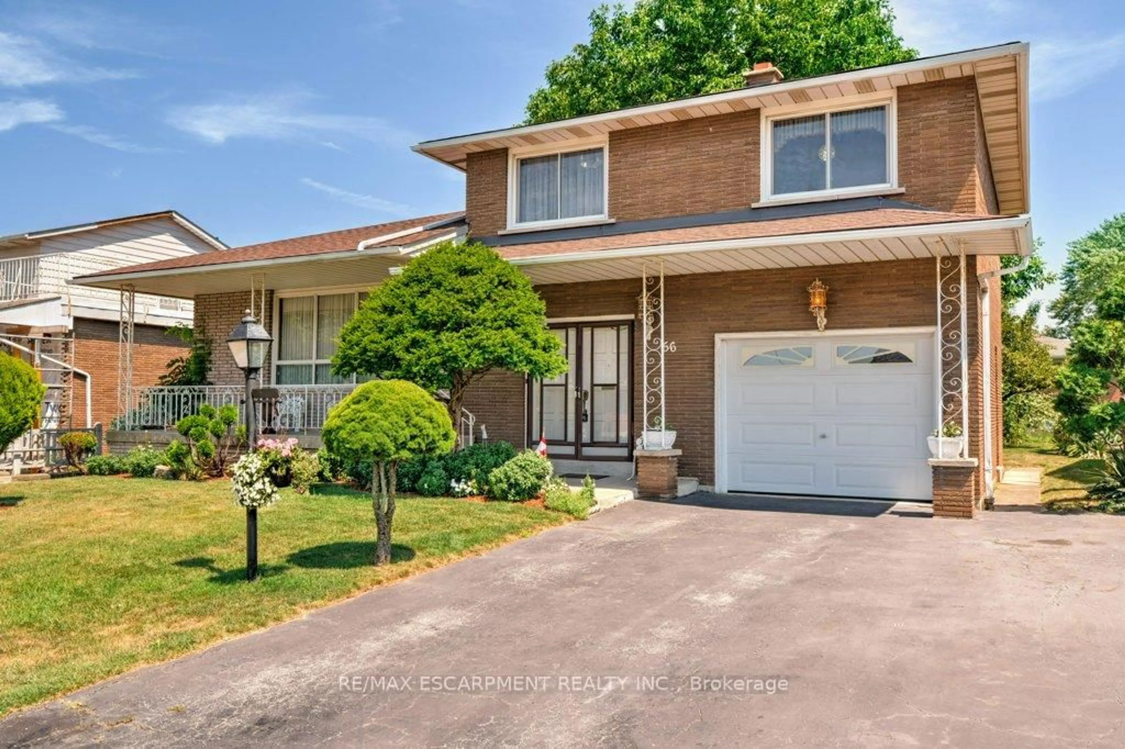 Home with brick exterior material, street for 56 Gray Rd, Hamilton Ontario L8G 2X5
