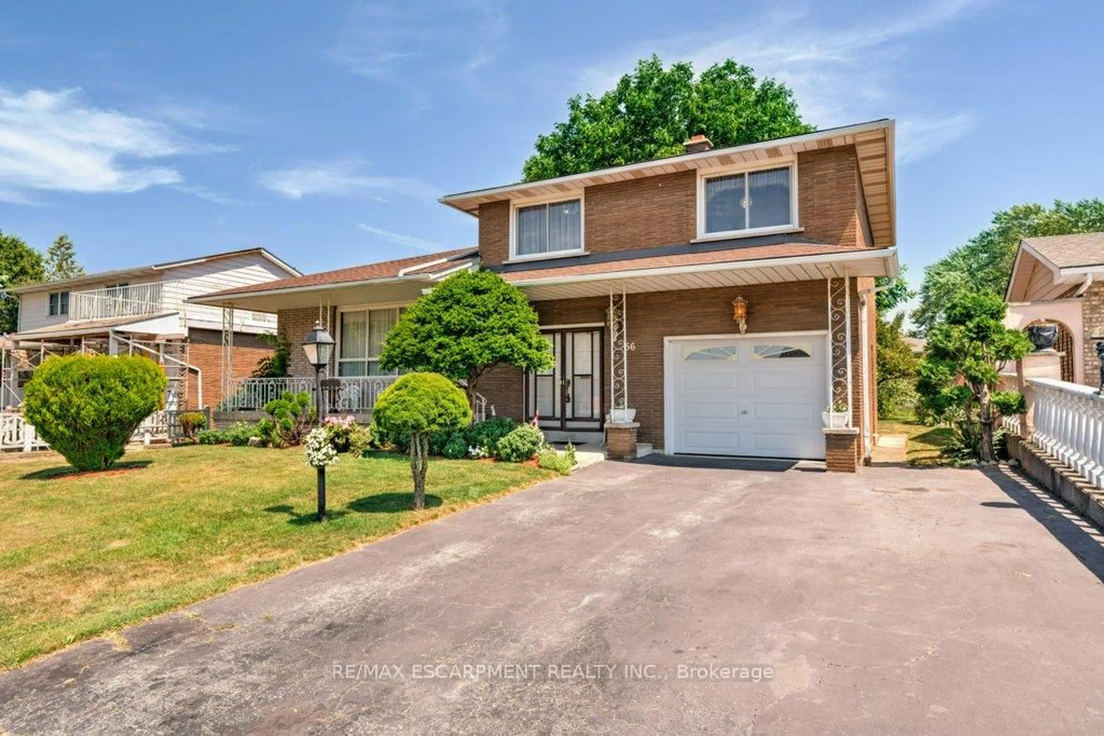 Home with vinyl exterior material, street for 56 Gray Rd, Hamilton Ontario L8G 2X5