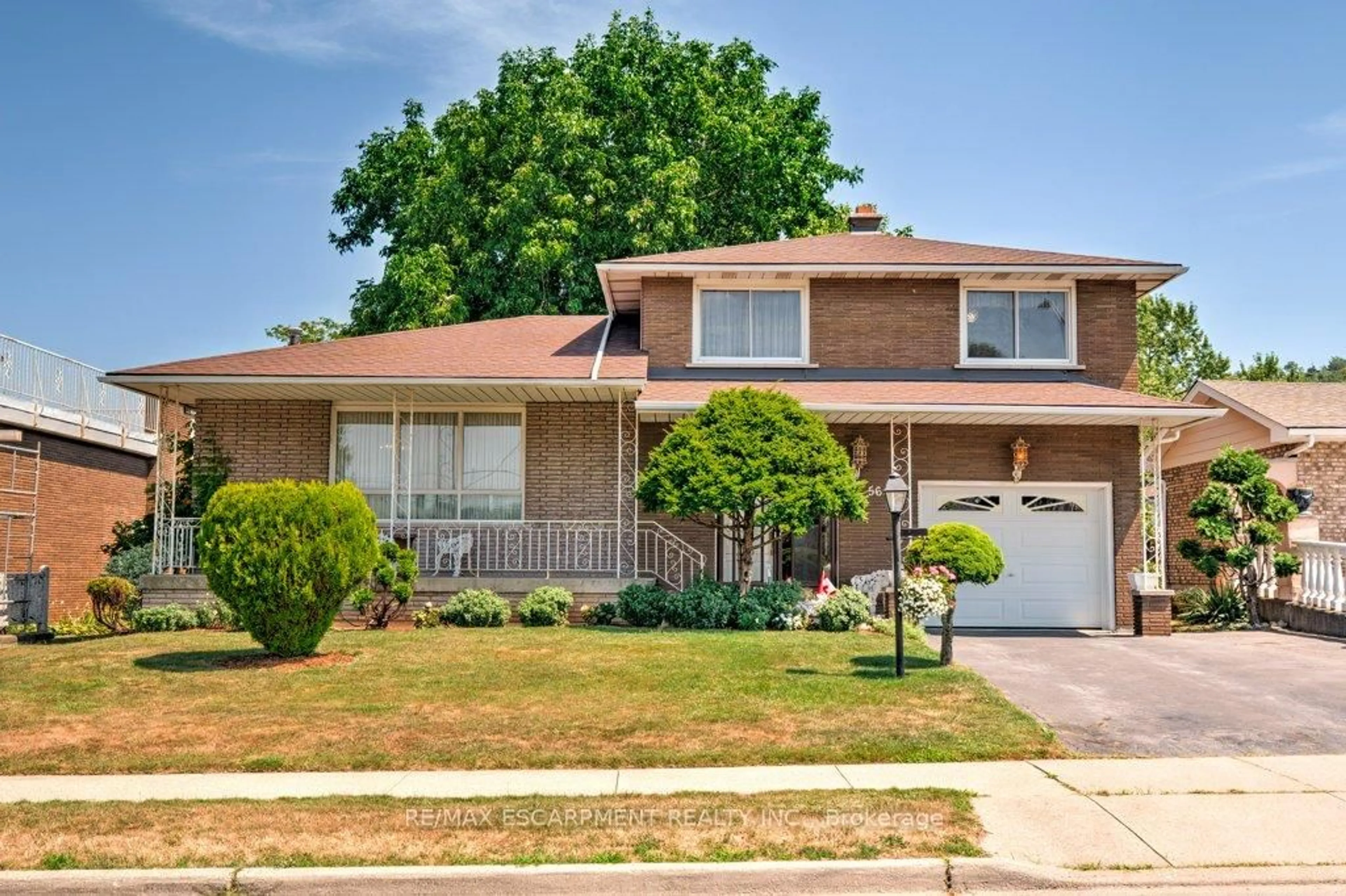 Home with vinyl exterior material, street for 56 Gray Rd, Hamilton Ontario L8G 2X5