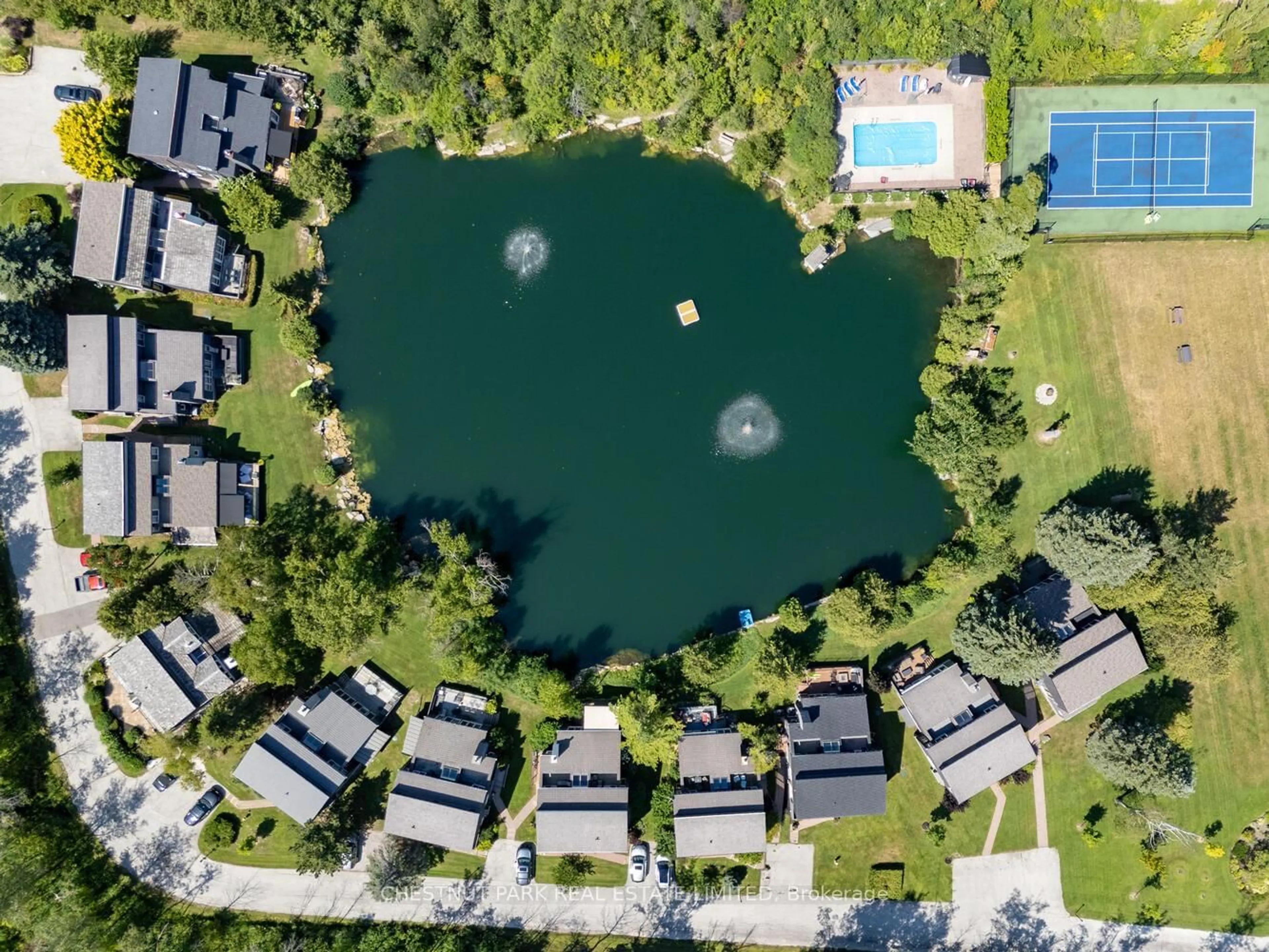 A pic from outside/outdoor area/front of a property/back of a property/a pic from drone, water/lake/river/ocean view for 116 Hidden Lake Rd #9, Blue Mountains Ontario L9Y 0T6