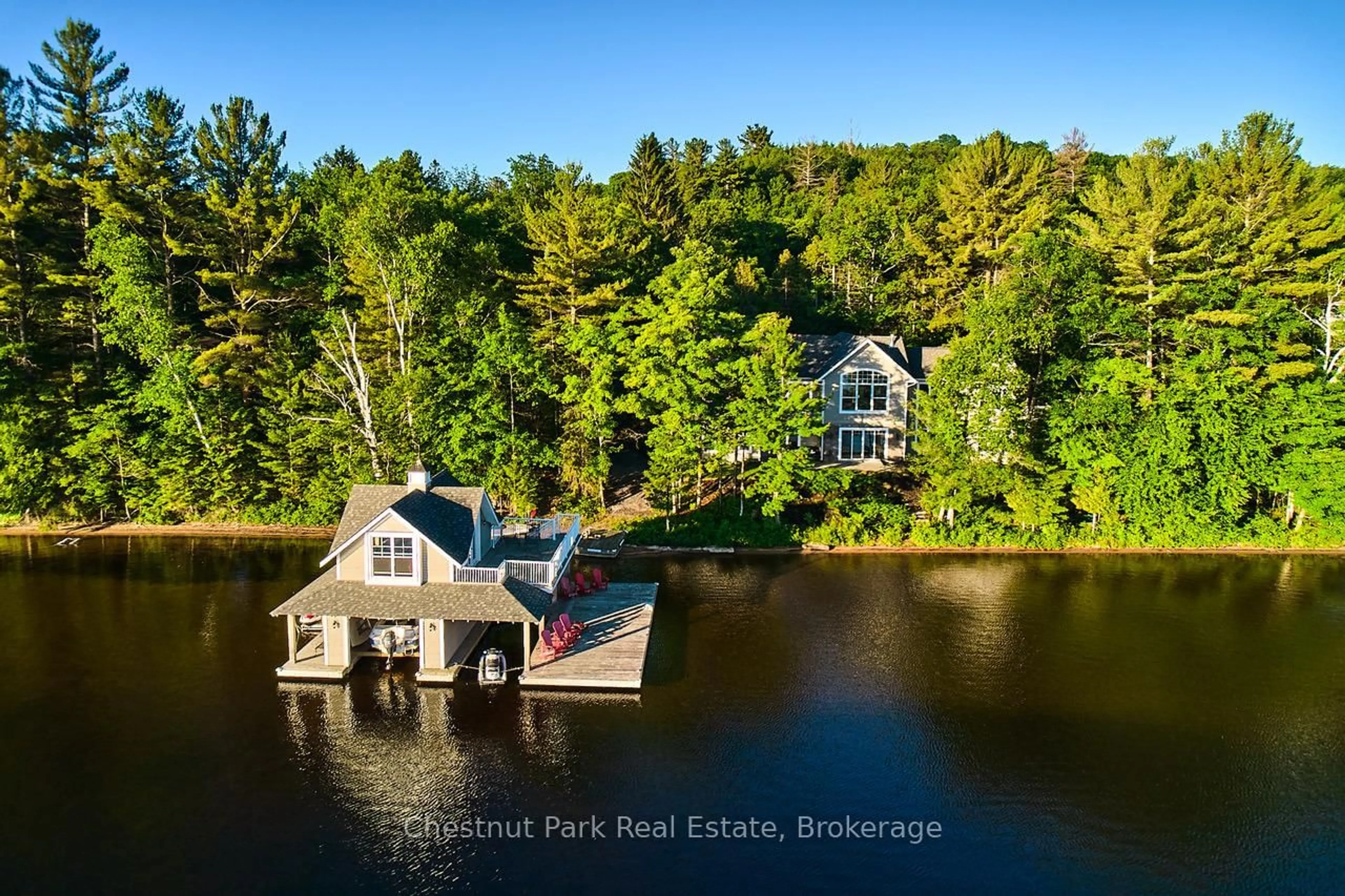 A pic from outside/outdoor area/front of a property/back of a property/a pic from drone, water/lake/river/ocean view for 624 Muskoka Road 10, Huntsville Ontario P0B 1L0