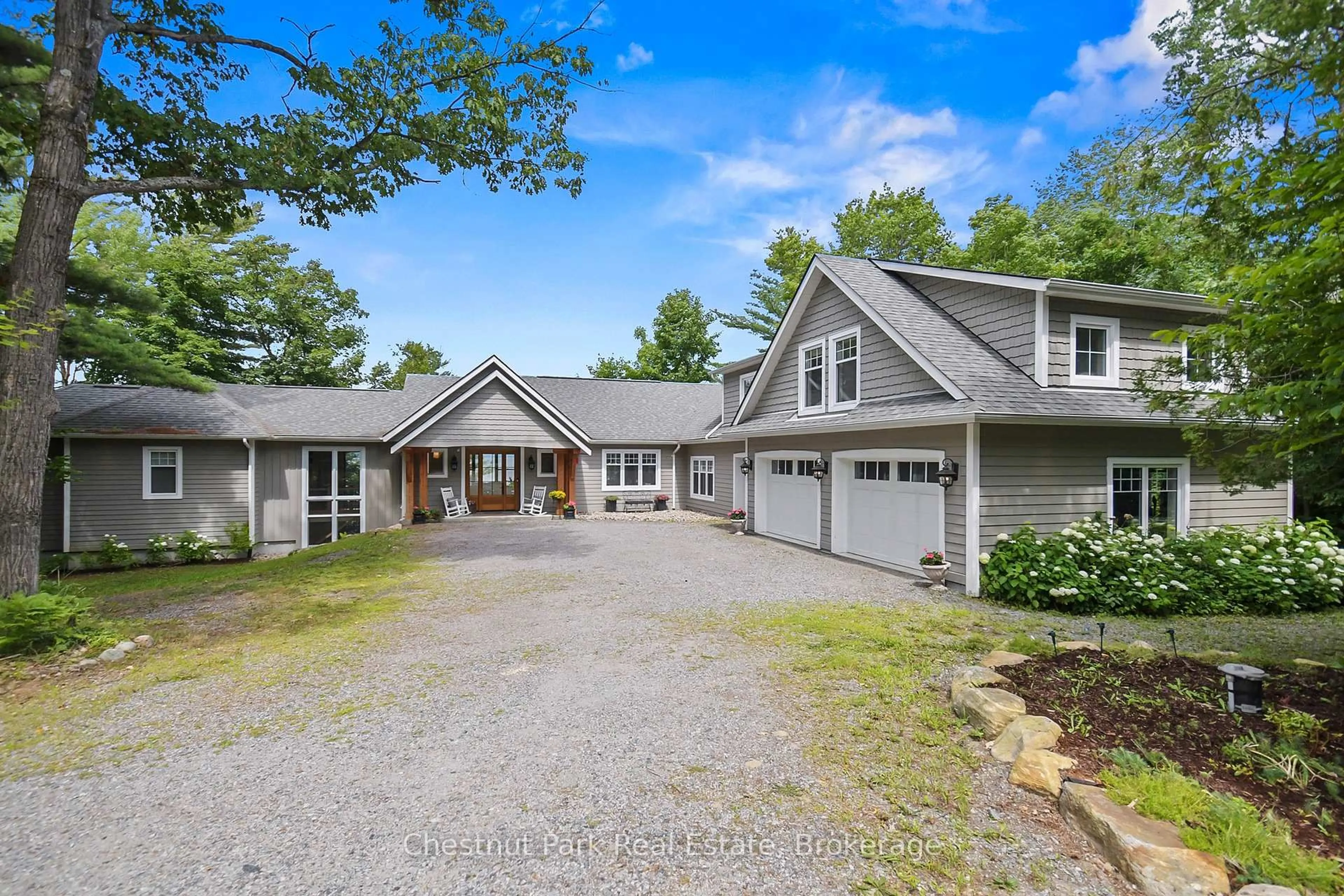 A pic from outside/outdoor area/front of a property/back of a property/a pic from drone, water/lake/river/ocean view for 624 Muskoka Road 10, Huntsville Ontario P0B 1L0