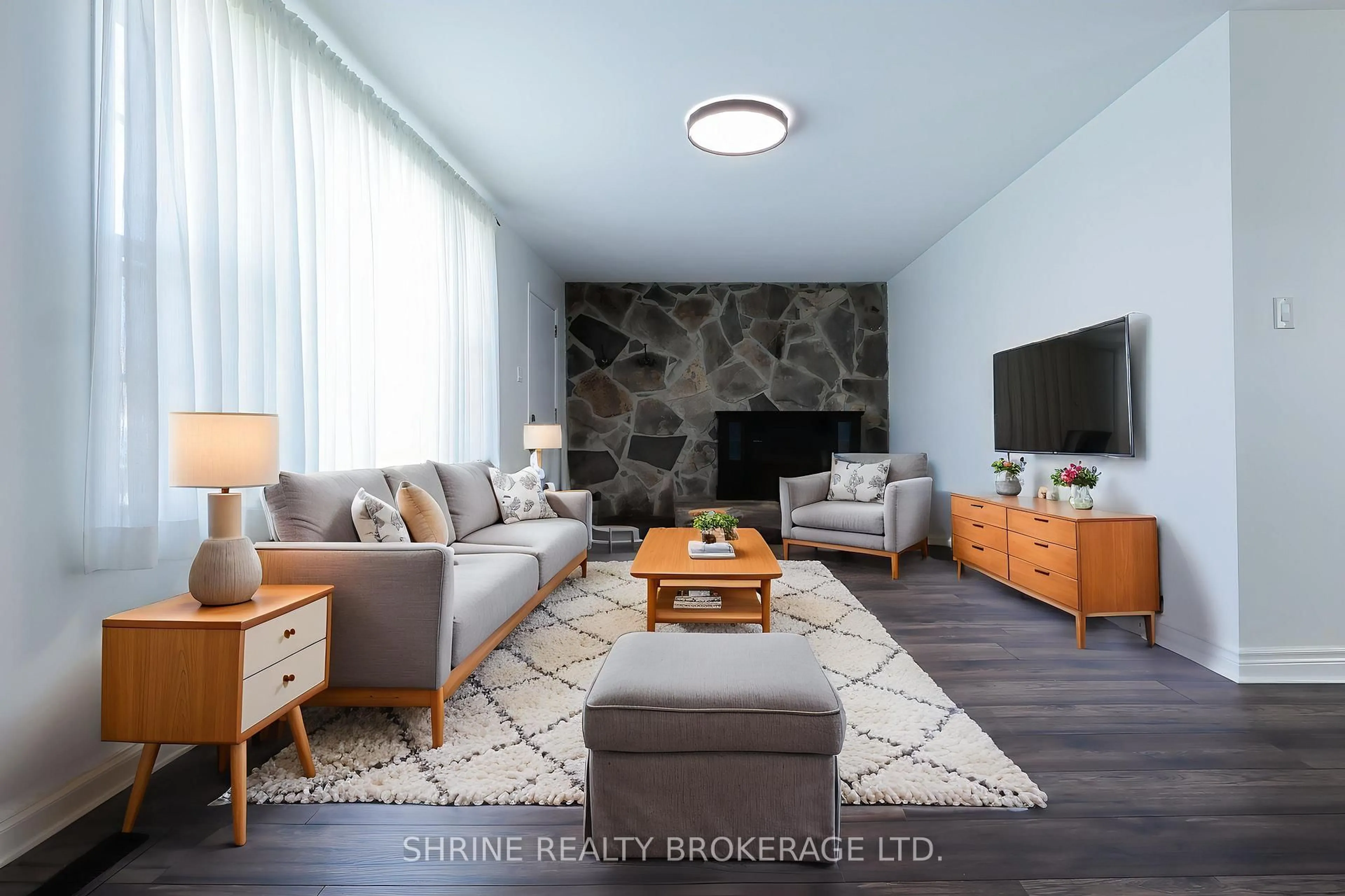 Living room with furniture, wood/laminate floor for 853 Queens Ave, London East Ontario N5W 3H7
