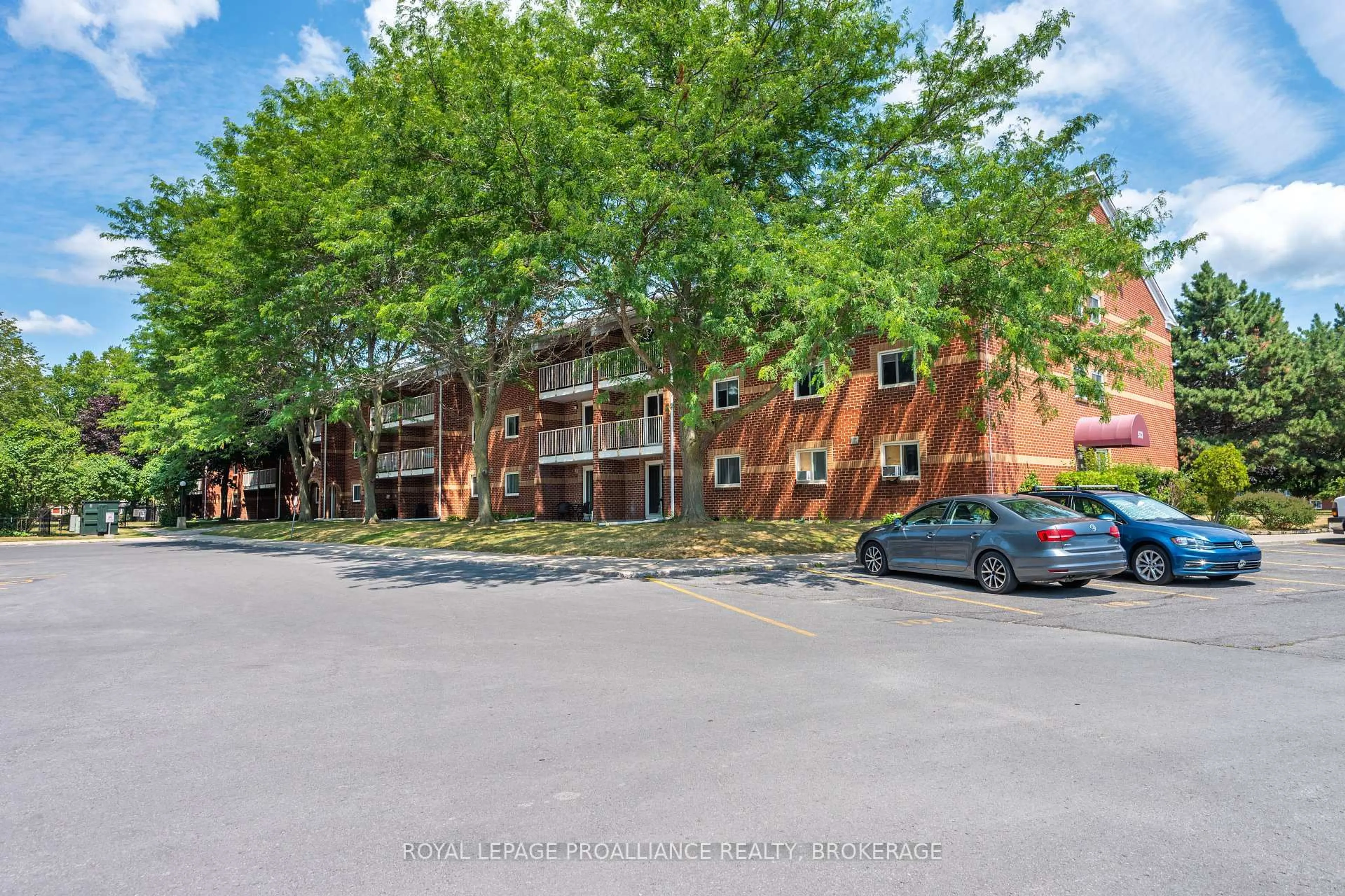 A pic from outside/outdoor area/front of a property/back of a property/a pic from drone, street for 573 Armstrong Rd #314, Kingston Ontario K7M 8J8
