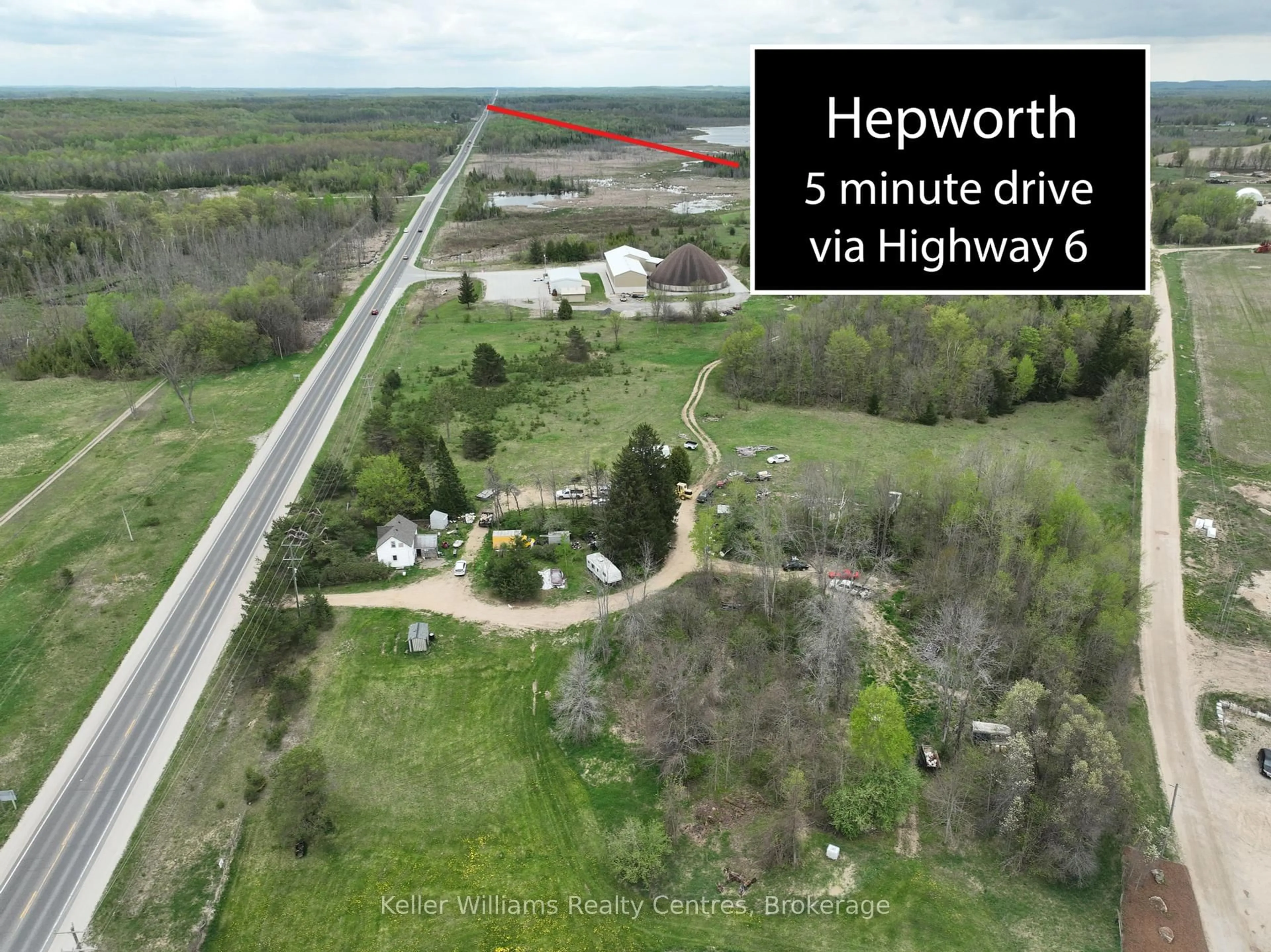 A pic from outside/outdoor area/front of a property/back of a property/a pic from drone, unknown for 19528 Highway 6, South Bruce Peninsula Ontario N0H 2T0