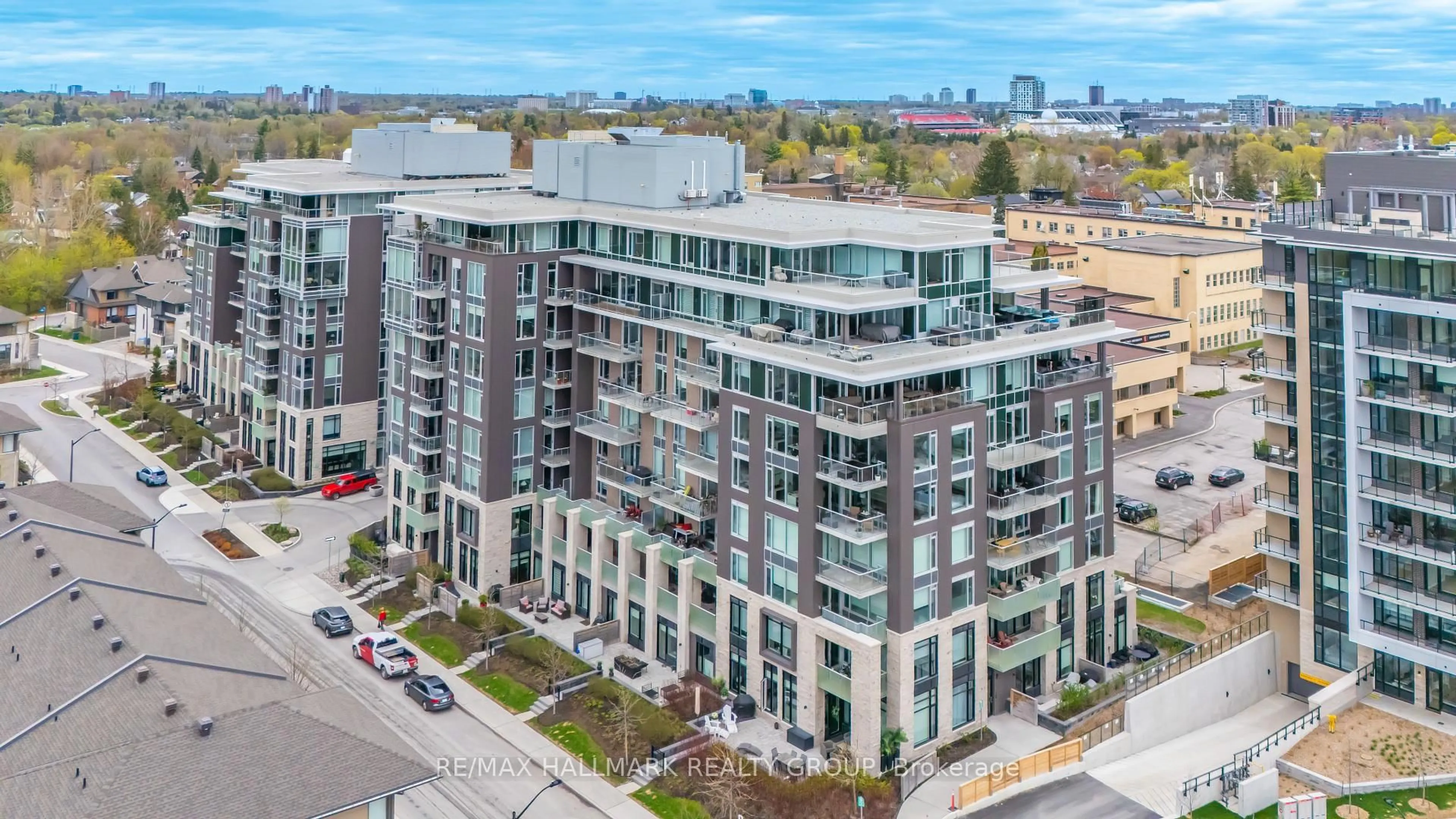 A pic from outside/outdoor area/front of a property/back of a property/a pic from drone, city buildings view from balcony for 570 De Mazenod Ave #503, Ottawa Ontario K1S 5X2