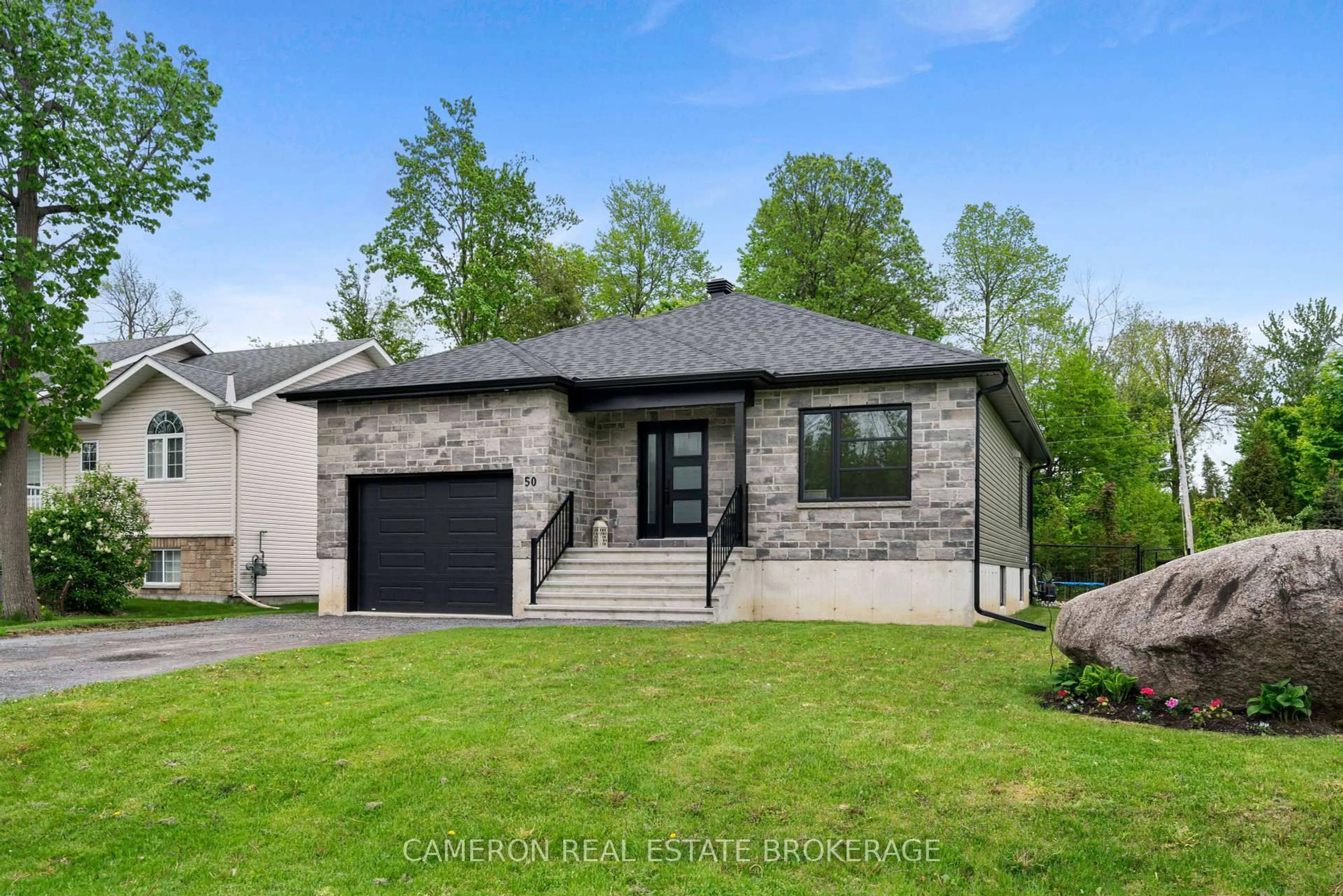 Home with brick exterior material, street for 50 Beech St, South Stormont Ontario K0C 1M0