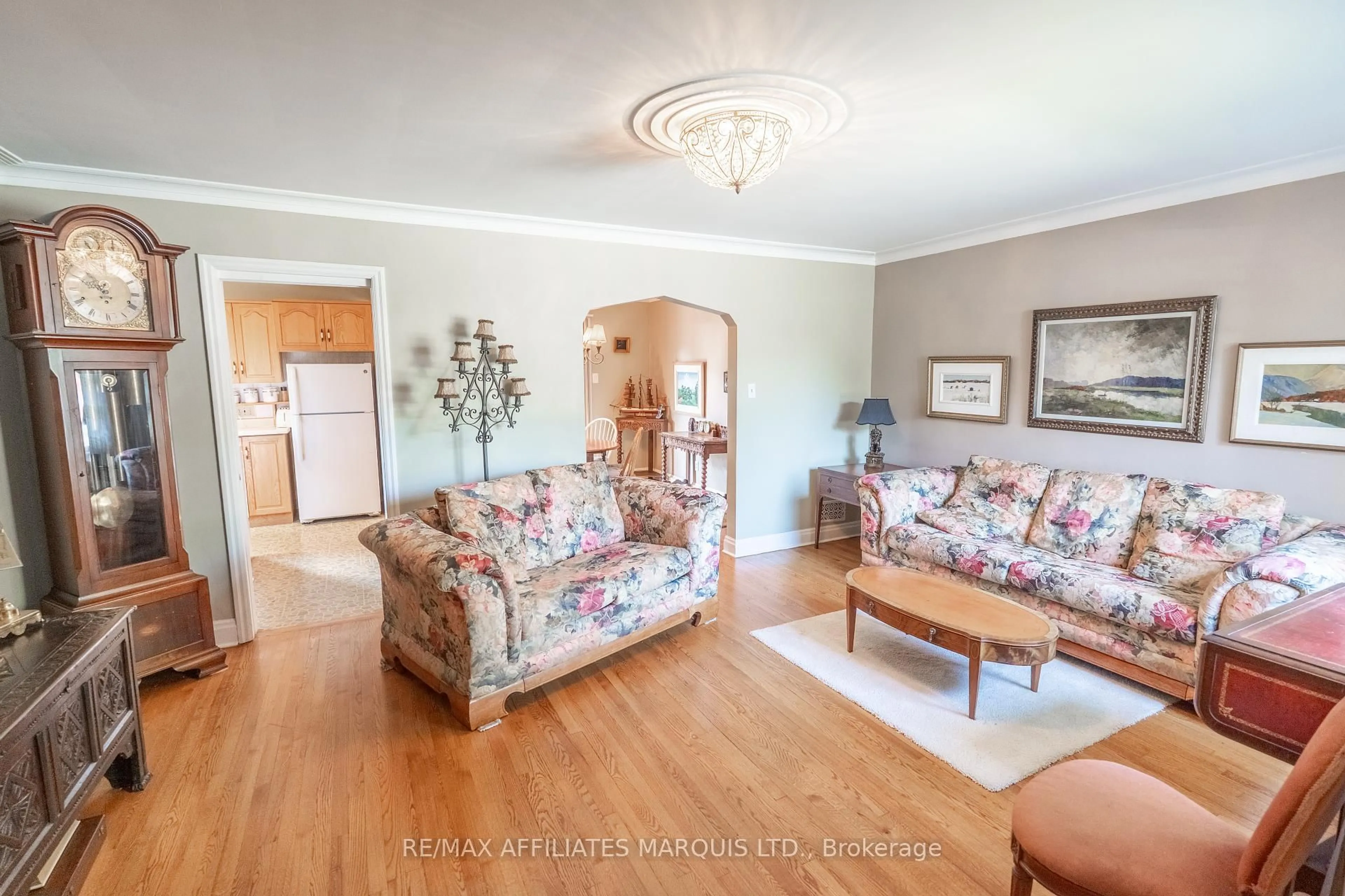 Living room with furniture, wood/laminate floor for 705 Second St, Cornwall Ontario K6H 1Z9