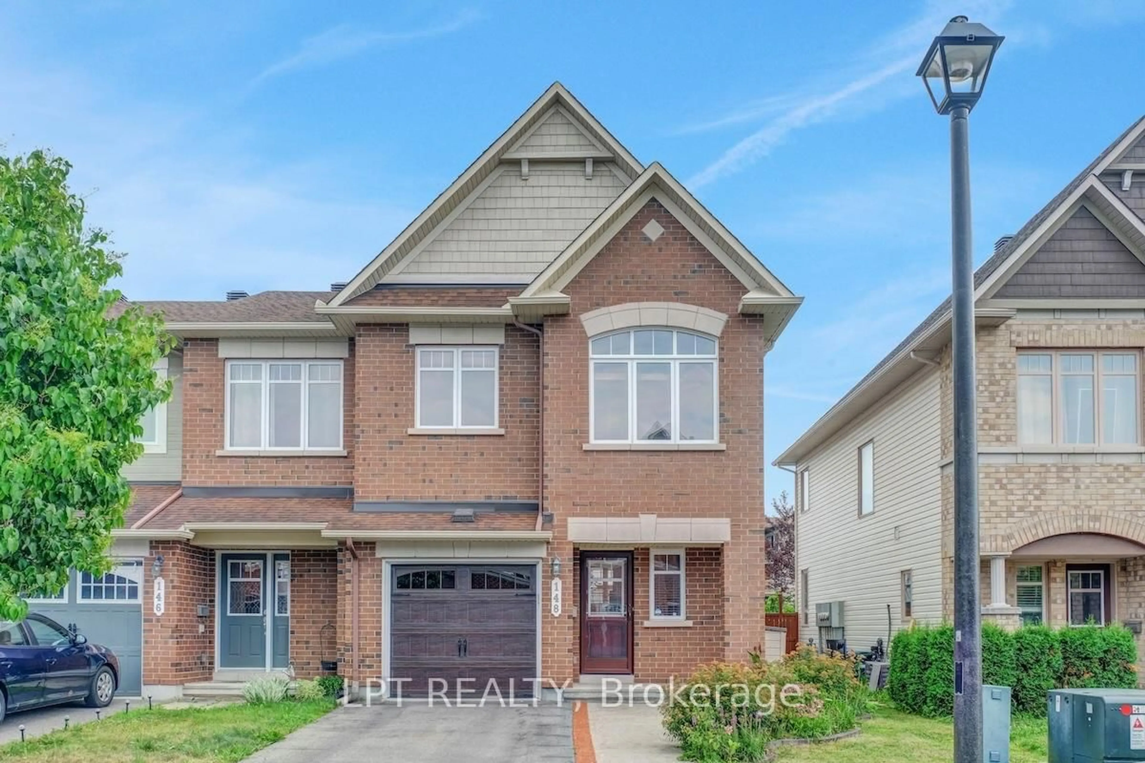 Home with brick exterior material, street for 148 Waterfern Way, Ottawa Ontario K4A 0T4