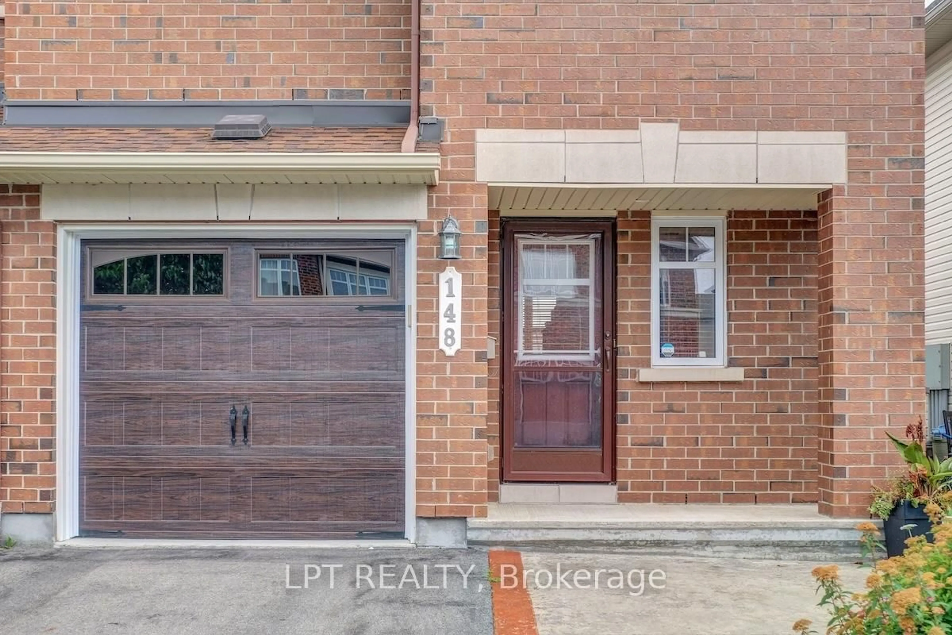 Home with brick exterior material, street for 148 Waterfern Way, Ottawa Ontario K4A 0T4
