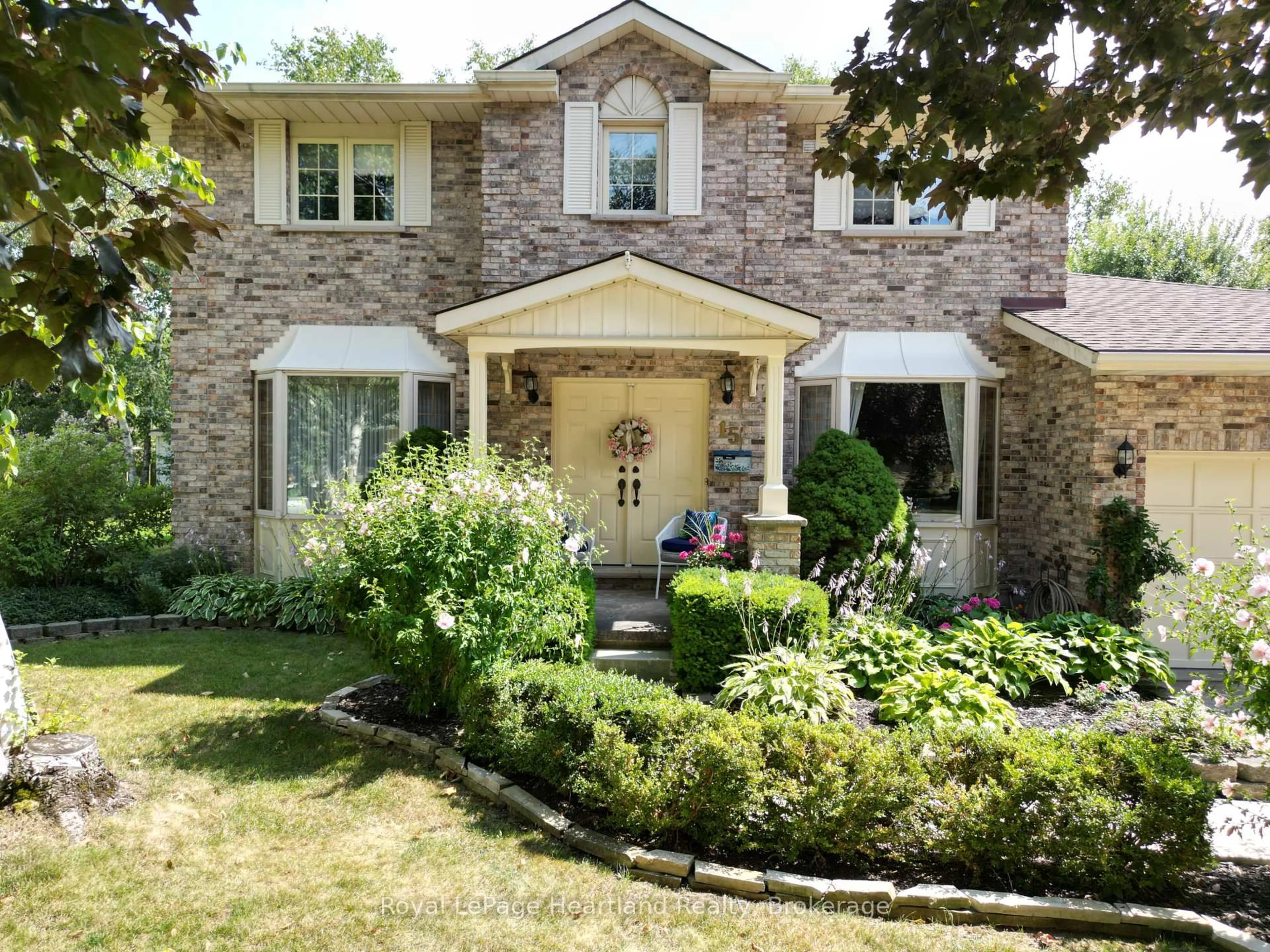 Home with brick exterior material, street for 15 Kingscourt Cres, South Huron Ontario N0M 1S1