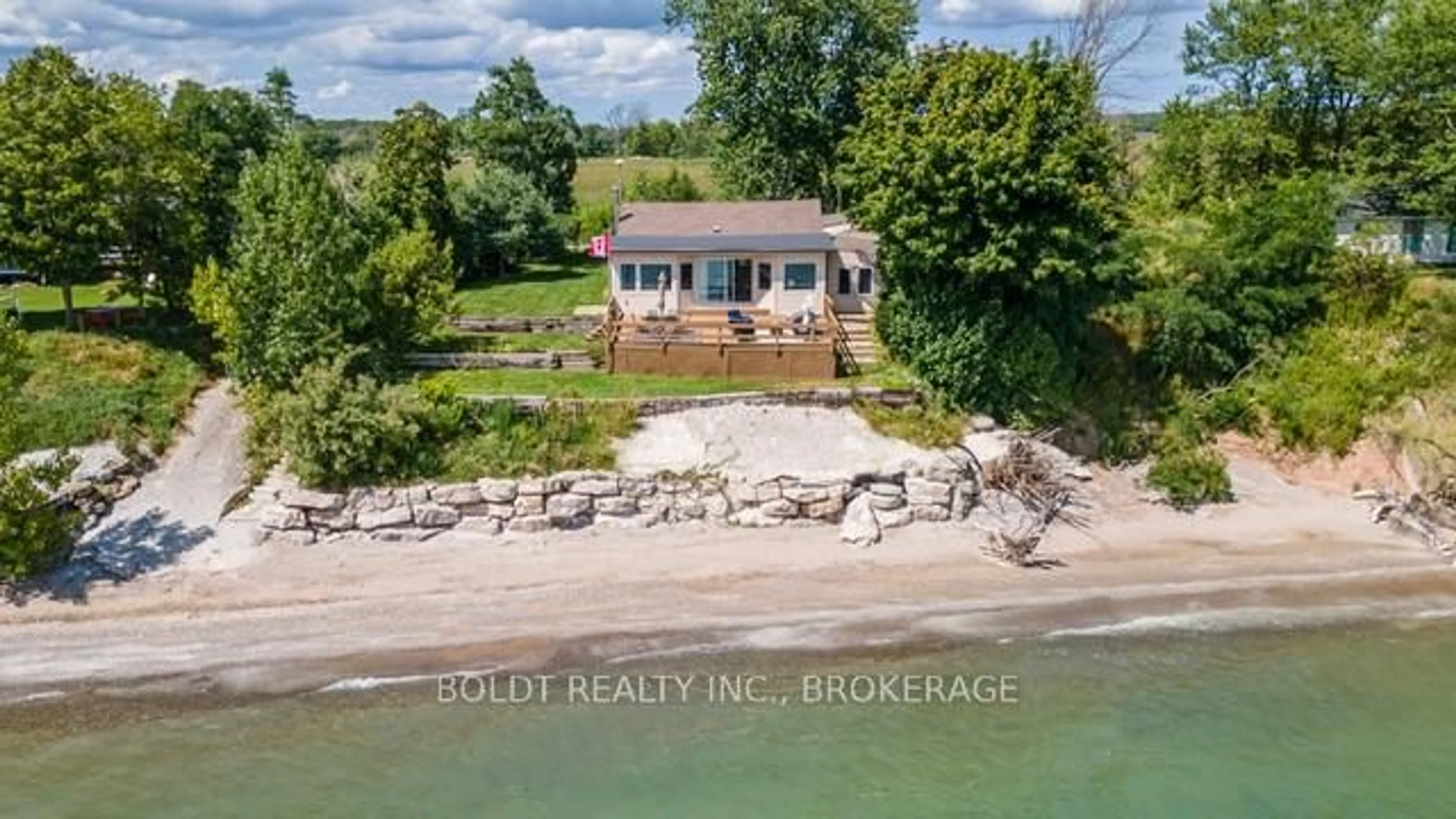 A pic from outside/outdoor area/front of a property/back of a property/a pic from drone, water/lake/river/ocean view for 47 Gull Line, Haldimand Ontario N0A 1K0