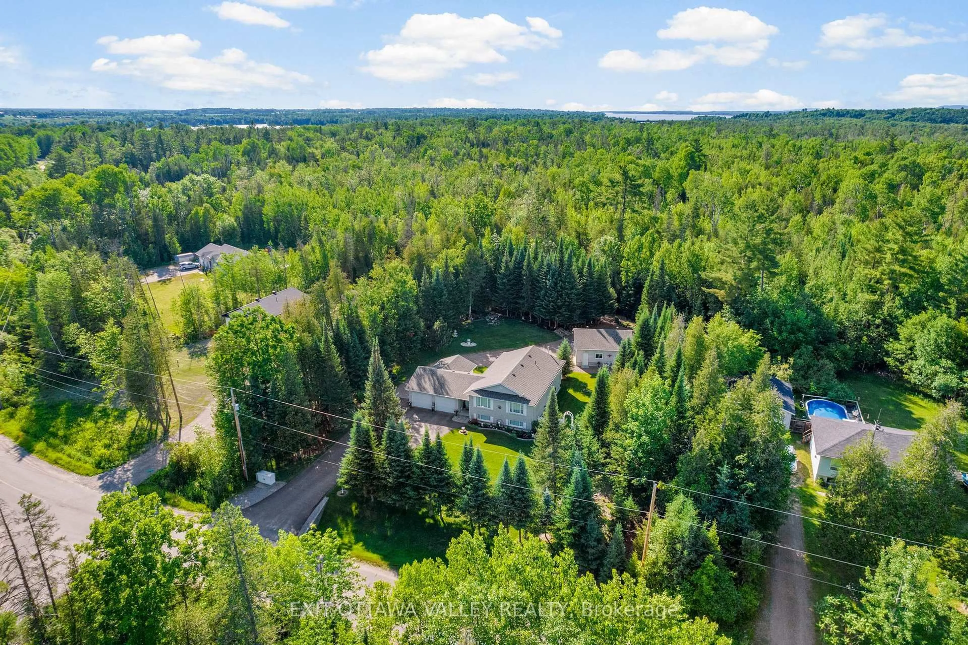 A pic from outside/outdoor area/front of a property/back of a property/a pic from drone, forest/trees view for 561 Forest Park Rd, Pembroke Ontario K8A 6W2