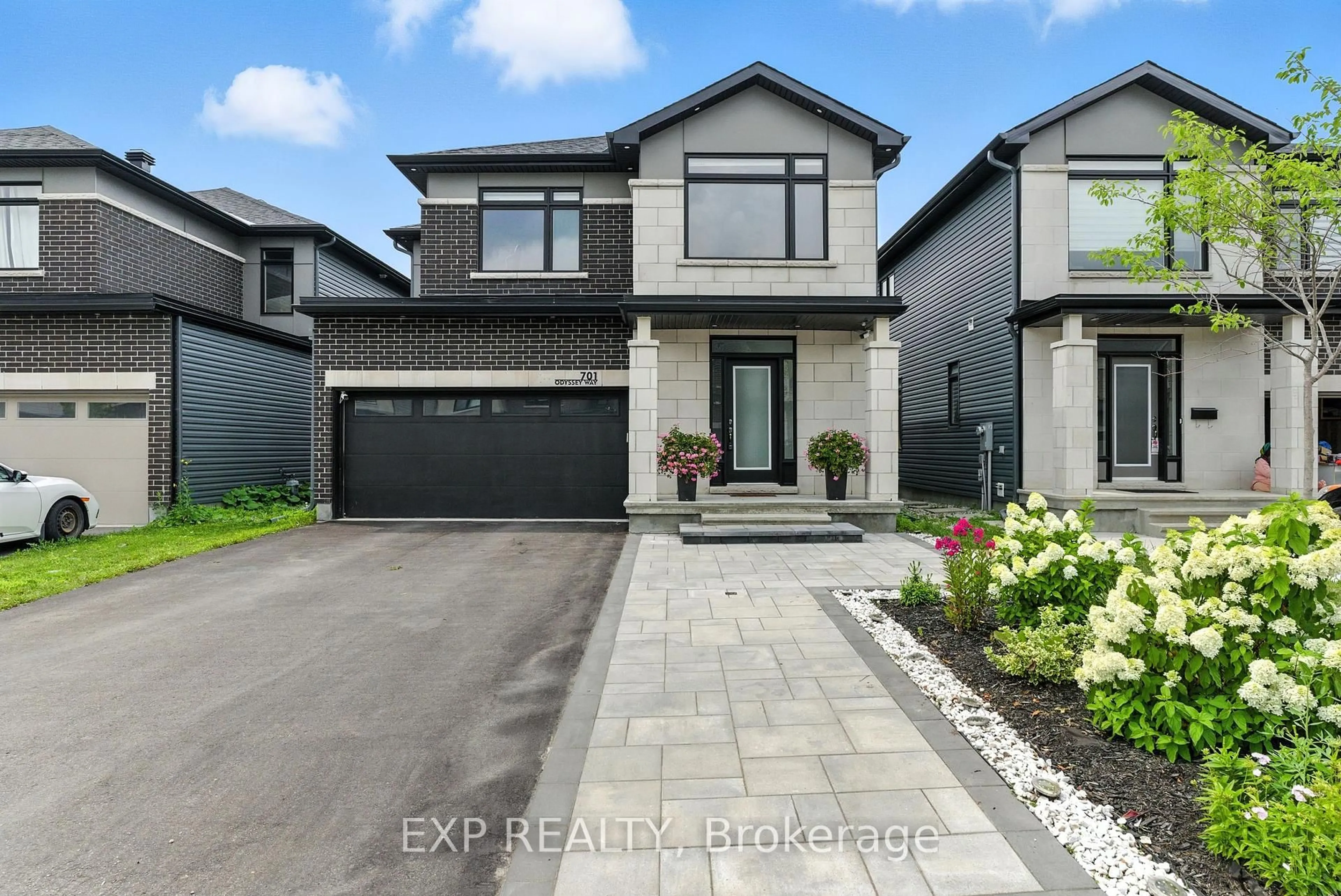 Home with brick exterior material, street for 701 Odyssey Way, Ottawa Ontario K1T 0V3