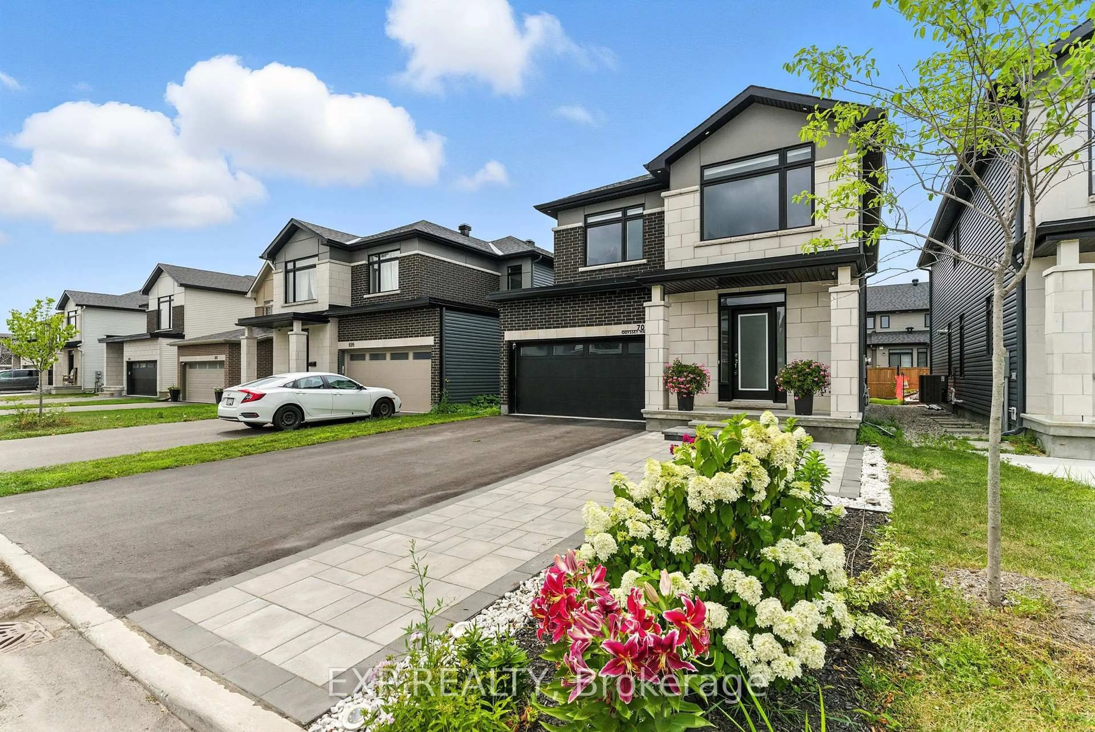Home with brick exterior material, street for 701 Odyssey Way, Ottawa Ontario K1T 0V3