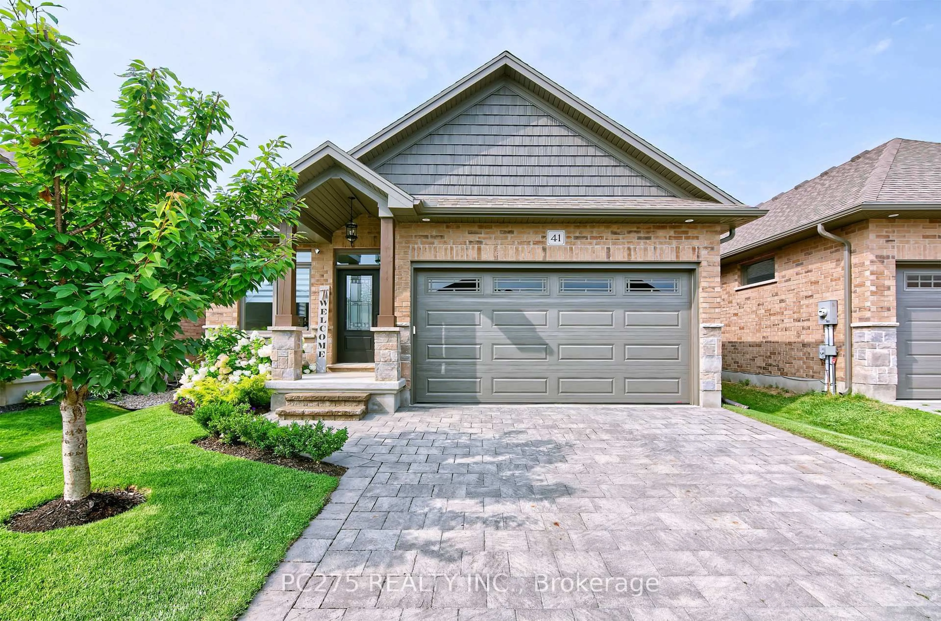 Home with brick exterior material, street for 159 Collins Way #41, Strathroy-Caradoc Ontario N7G 0G8