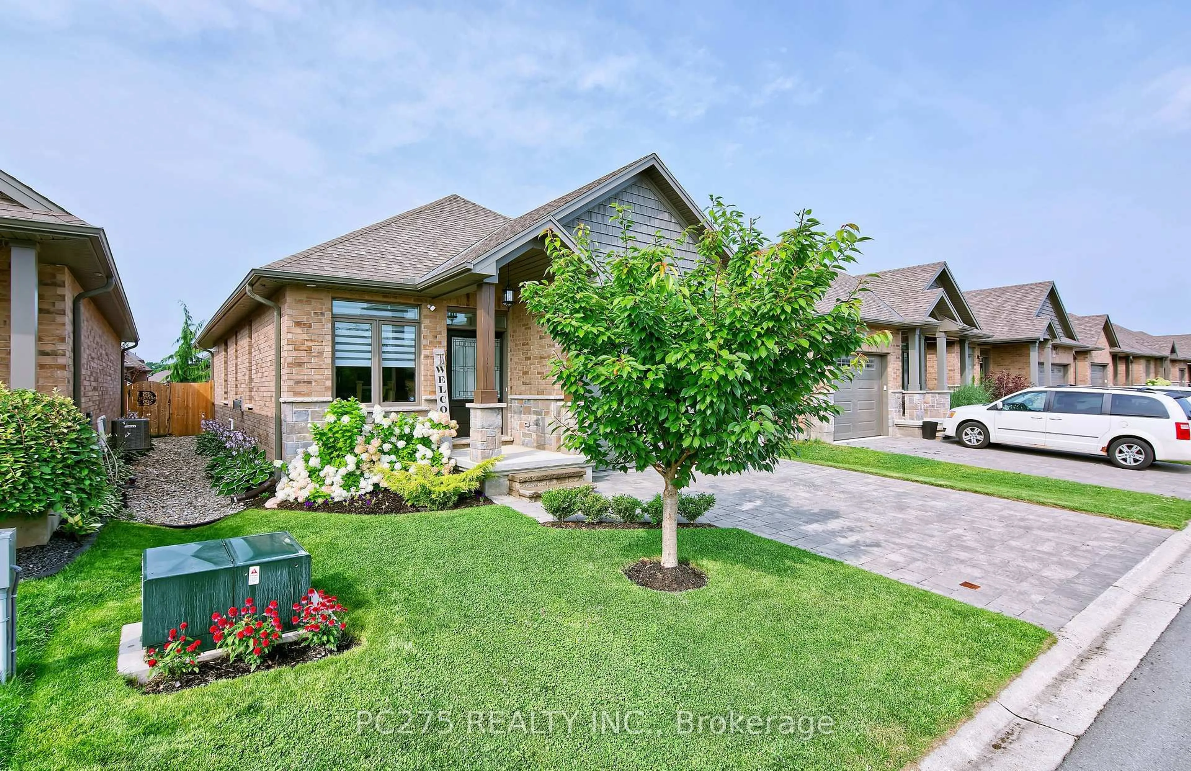 Home with brick exterior material, street for 159 Collins Way #41, Strathroy-Caradoc Ontario N7G 0G8