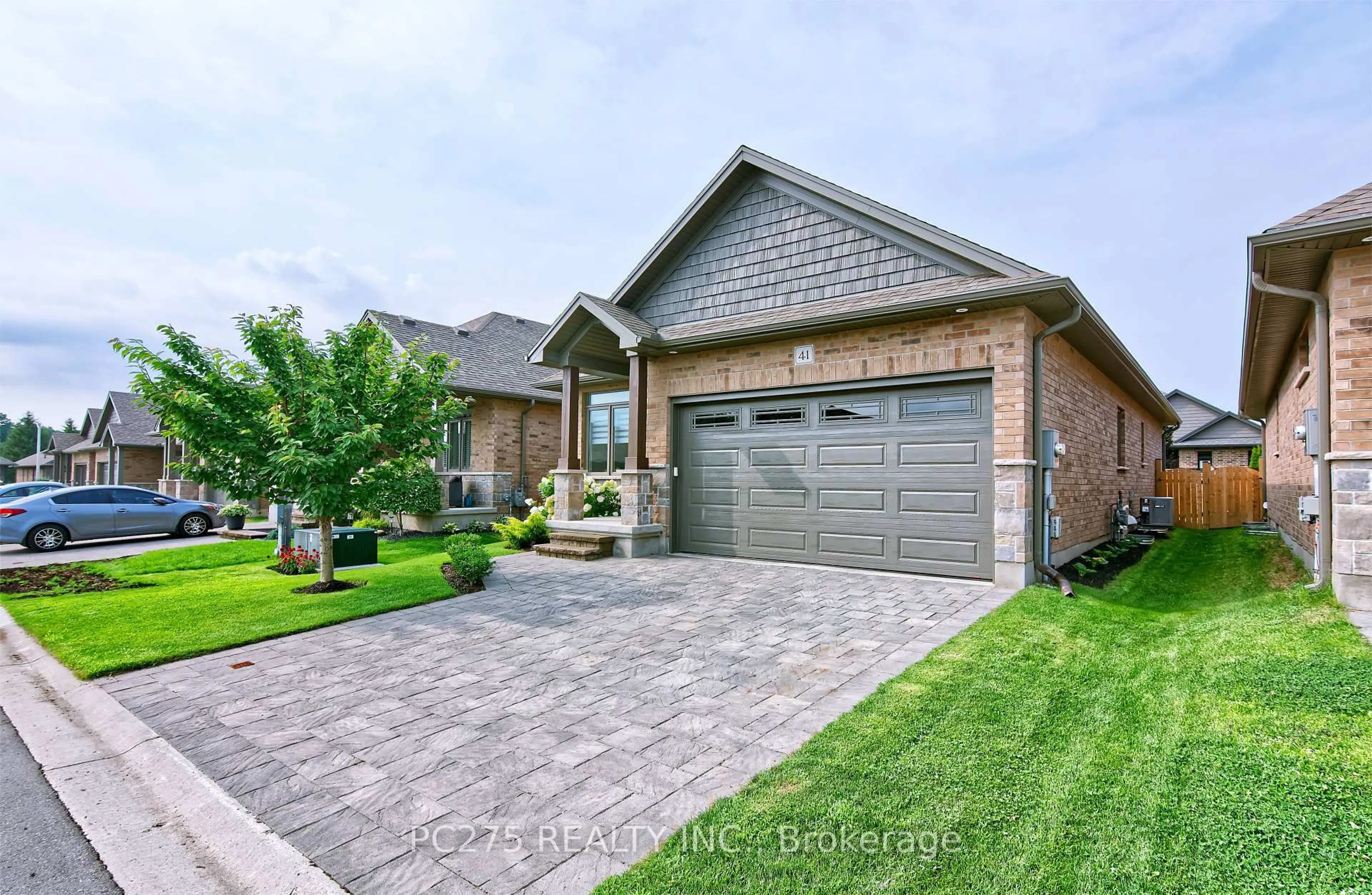 Home with brick exterior material, street for 159 Collins Way #41, Strathroy-Caradoc Ontario N7G 0G8