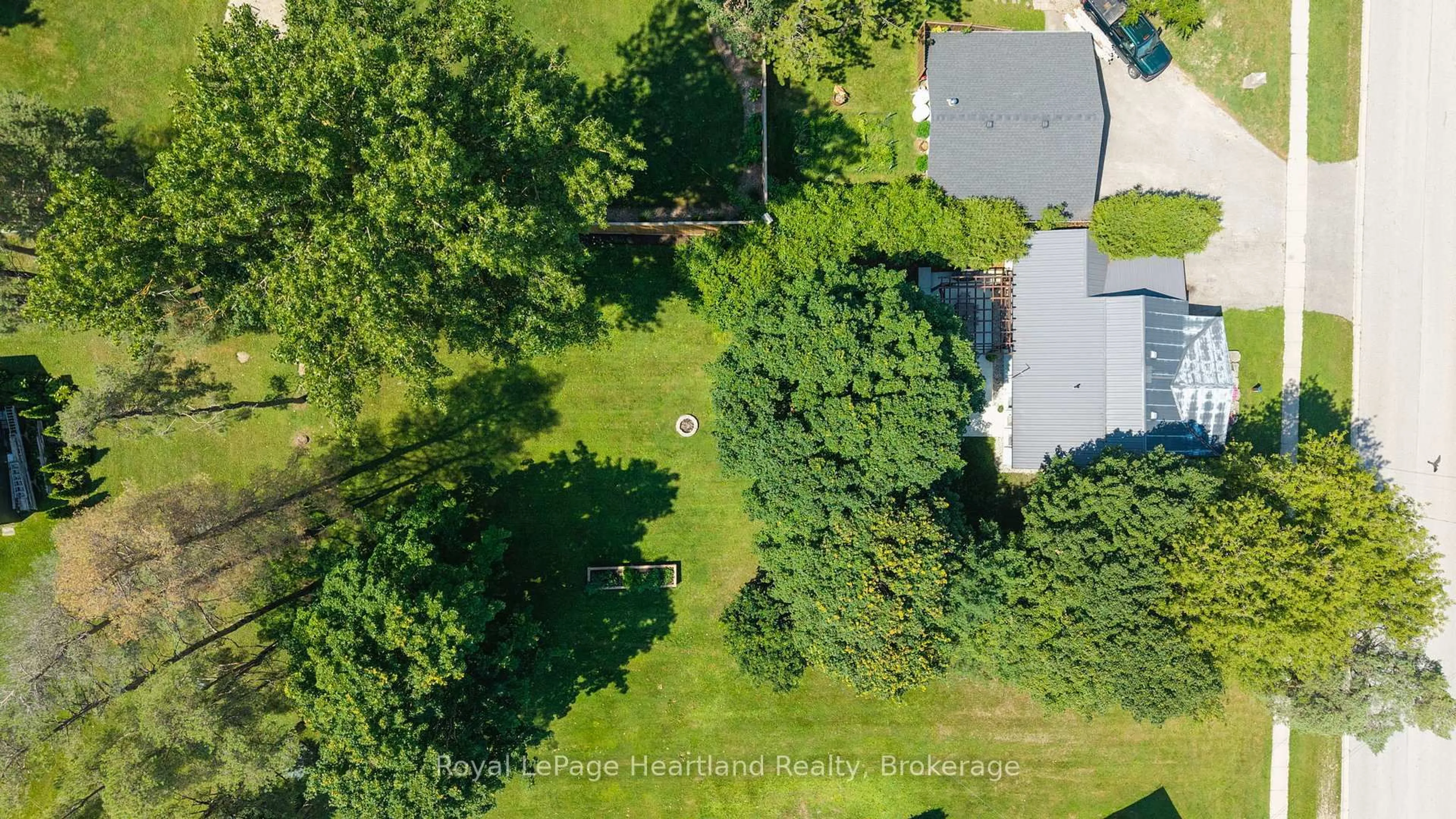 A pic from outside/outdoor area/front of a property/back of a property/a pic from drone, forest/trees view for 3034 Louisa St, Howick Ontario N0G 1V0