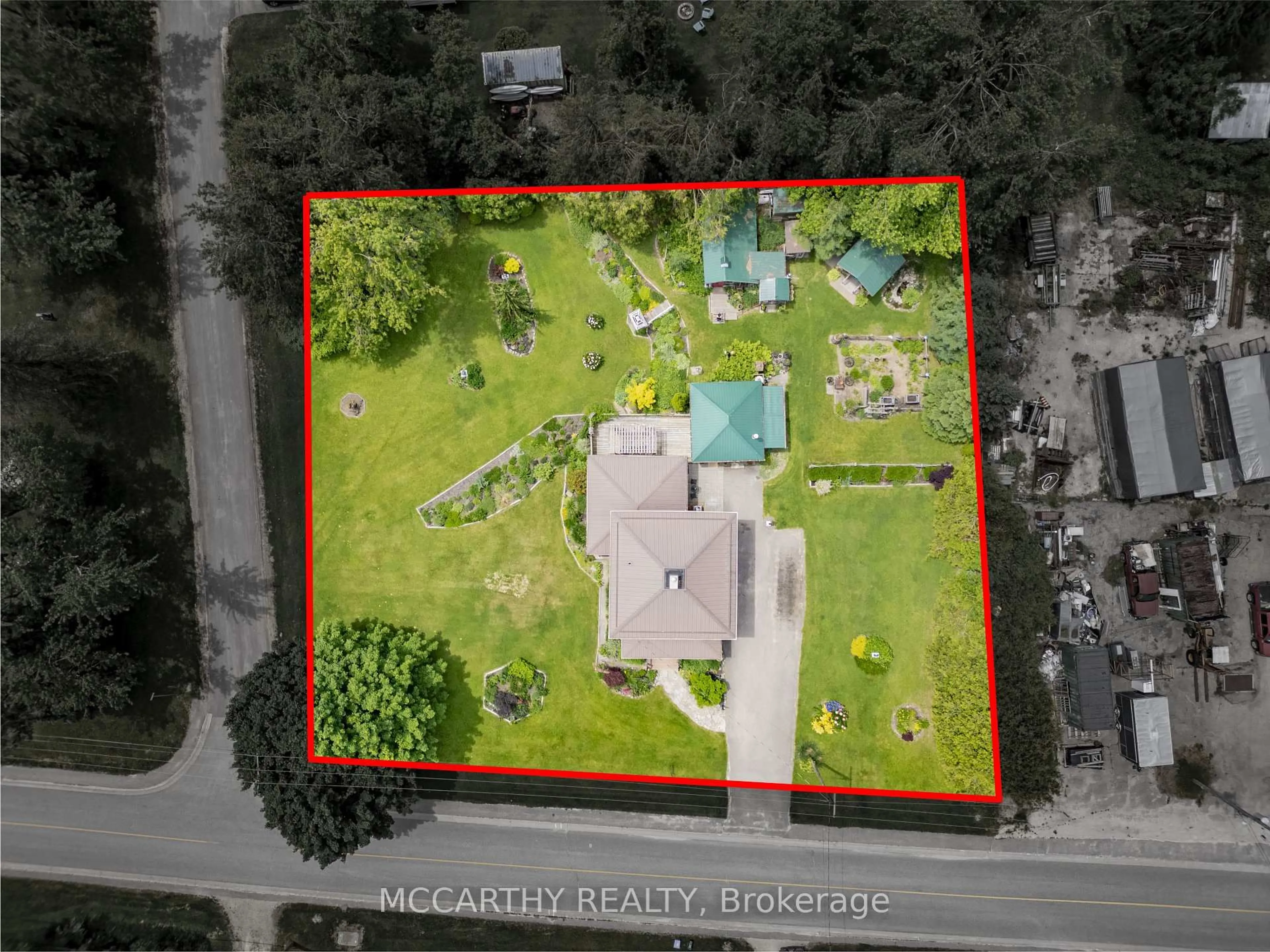 A pic from outside/outdoor area/front of a property/back of a property/a pic from drone, street for 260 Main St, Melancthon Ontario L0N 1J0