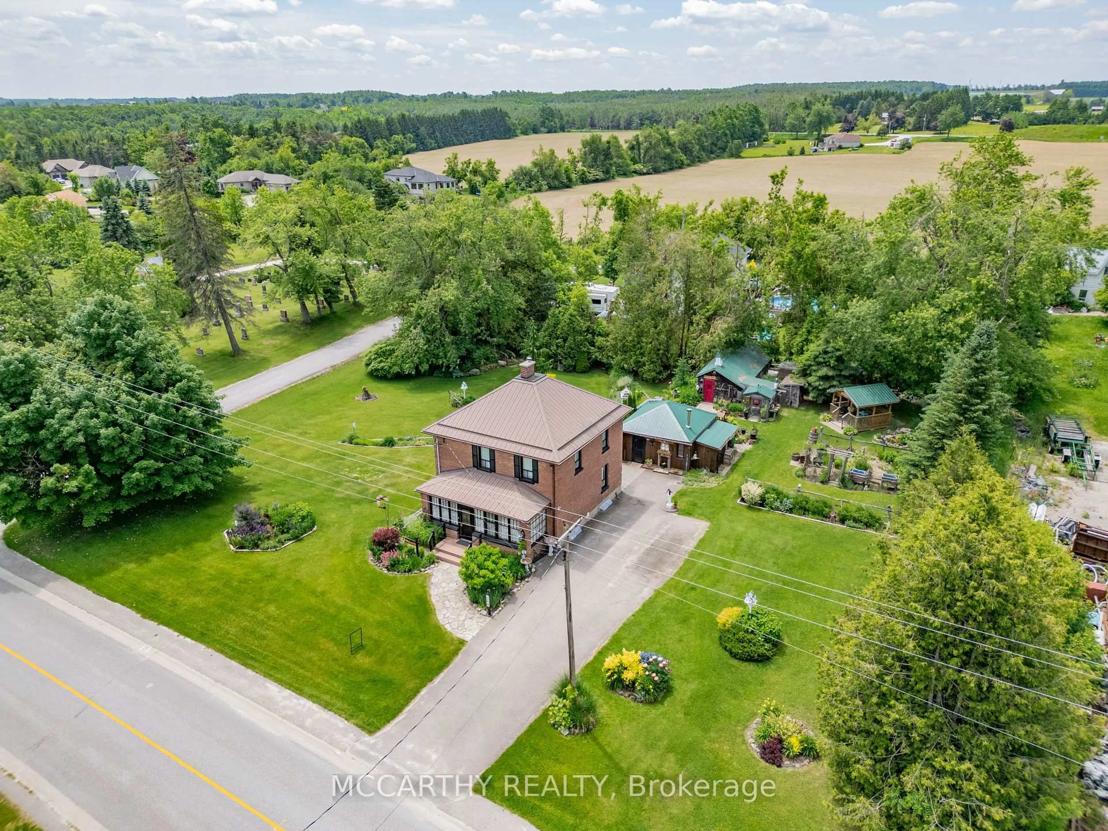 A pic from outside/outdoor area/front of a property/back of a property/a pic from drone, water/lake/river/ocean view for 260 Main St, Melancthon Ontario L0N 1J0