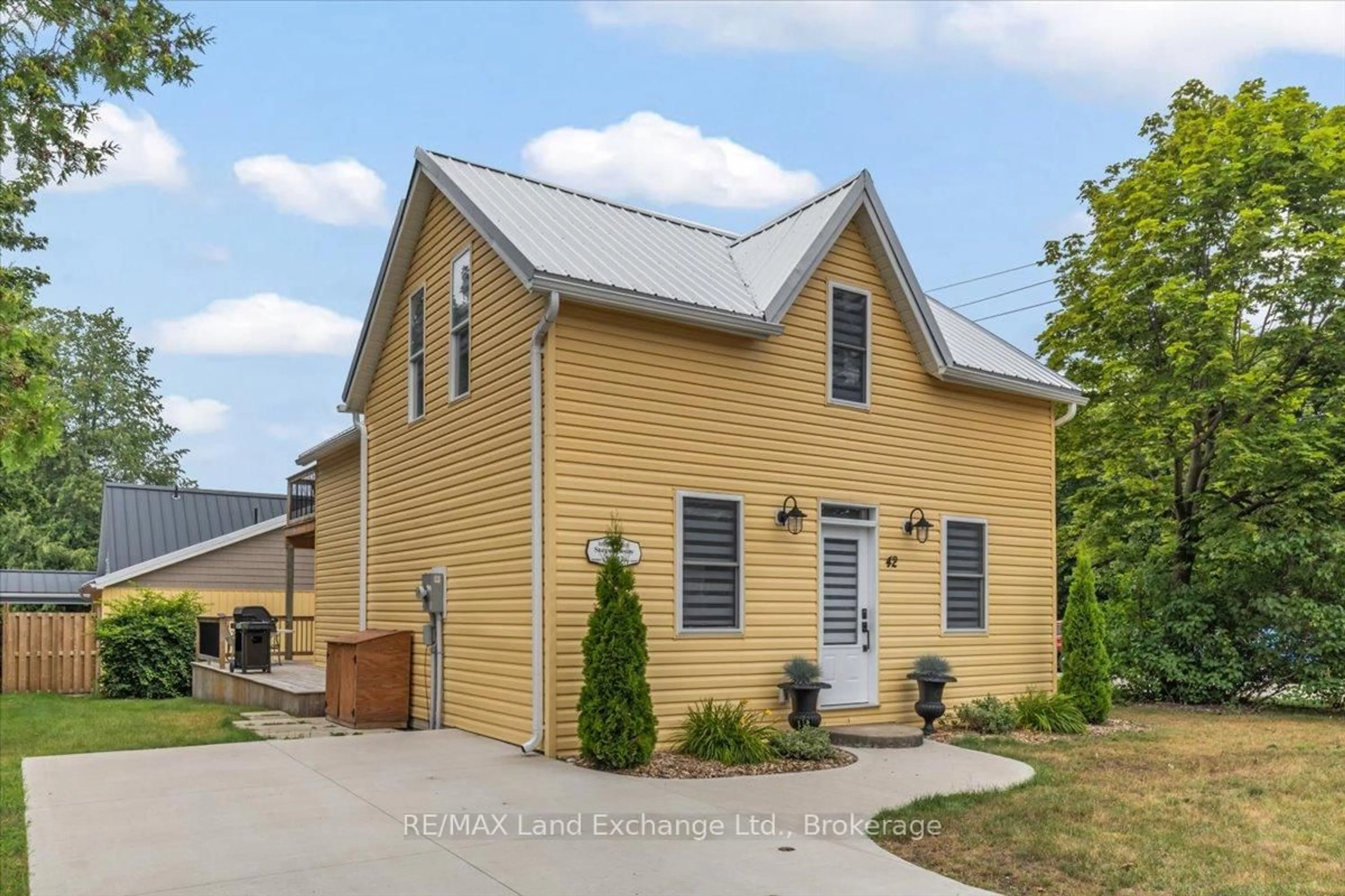 Home with vinyl exterior material, street for 42 Huron St, Saugeen Shores Ontario N0H 2L0