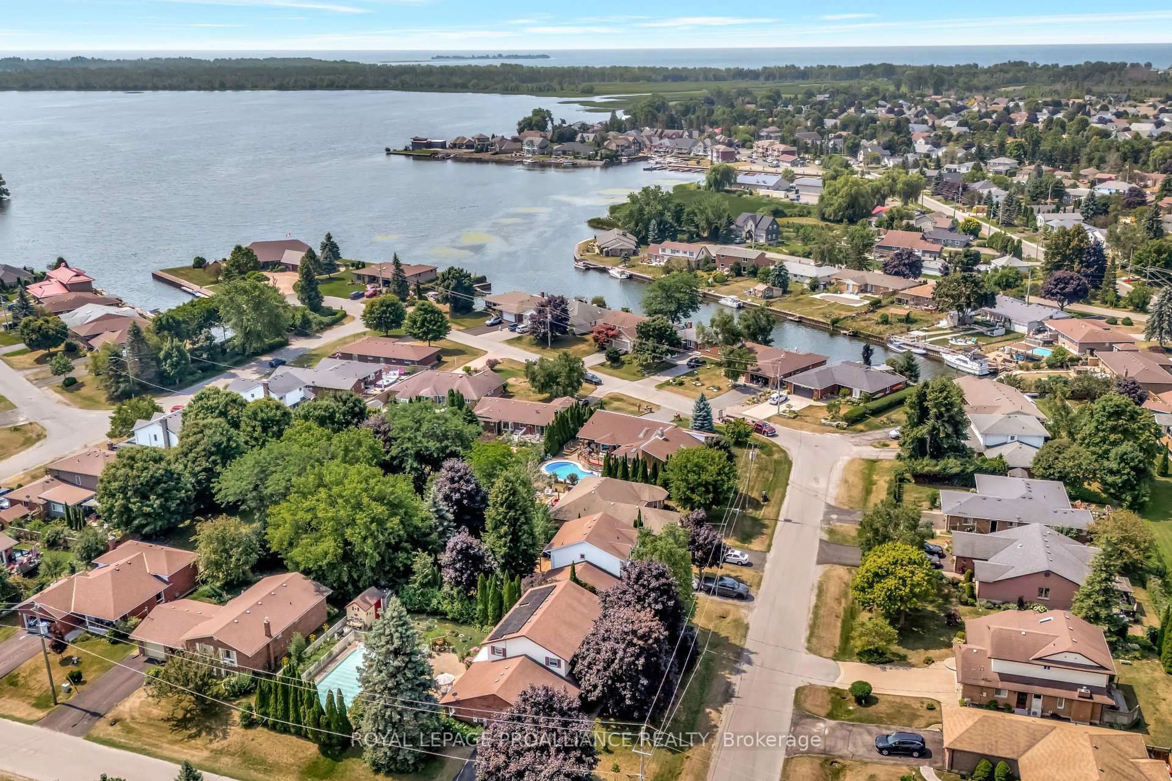 A pic from outside/outdoor area/front of a property/back of a property/a pic from drone, water/lake/river/ocean view for 7 Brintnell Blvd, Brighton Ontario K0K 1H0