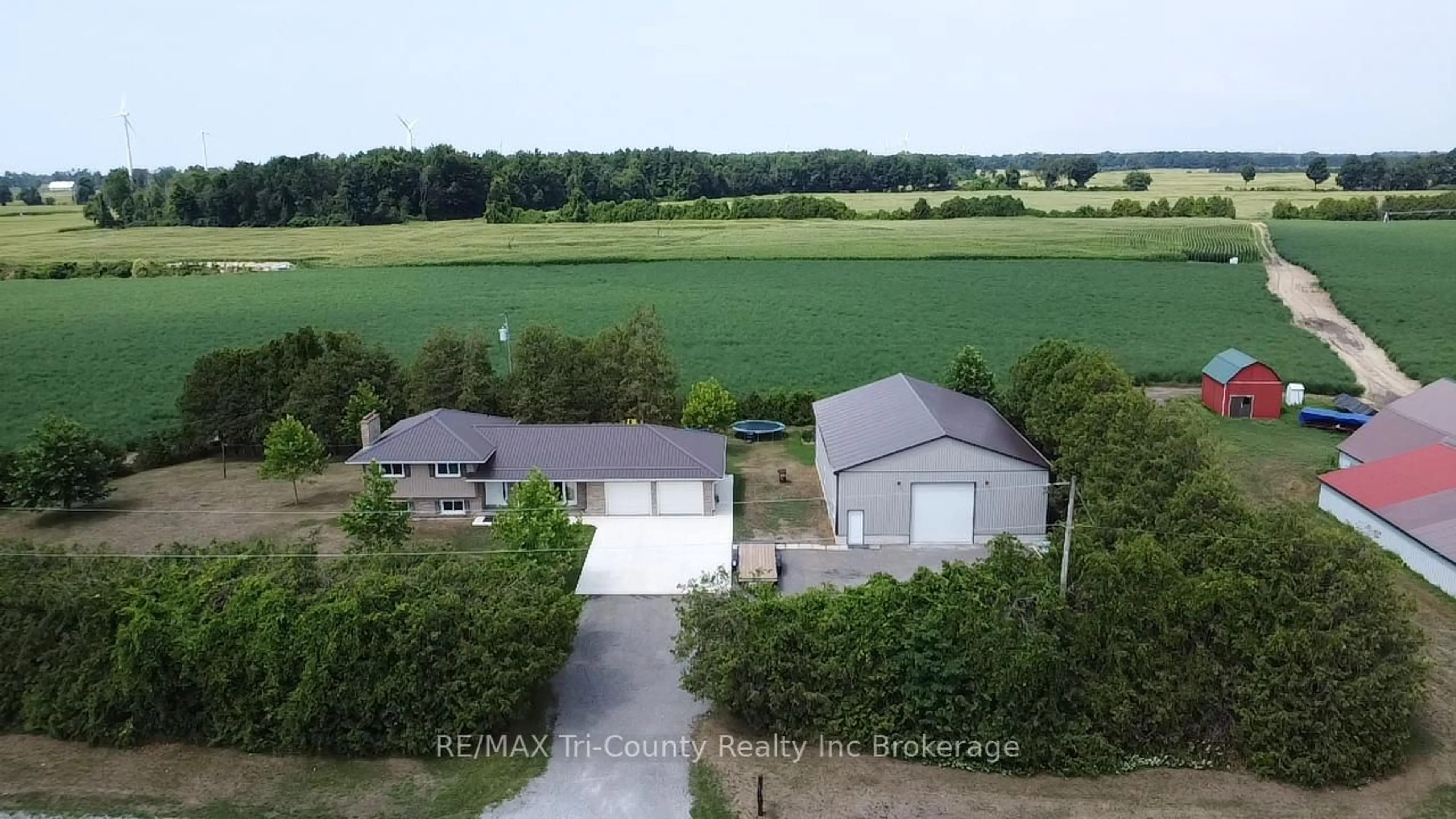 A pic from outside/outdoor area/front of a property/back of a property/a pic from drone, unknown for 305 Norfolk County 28 Rd, Norfolk Ontario N0E 1G0