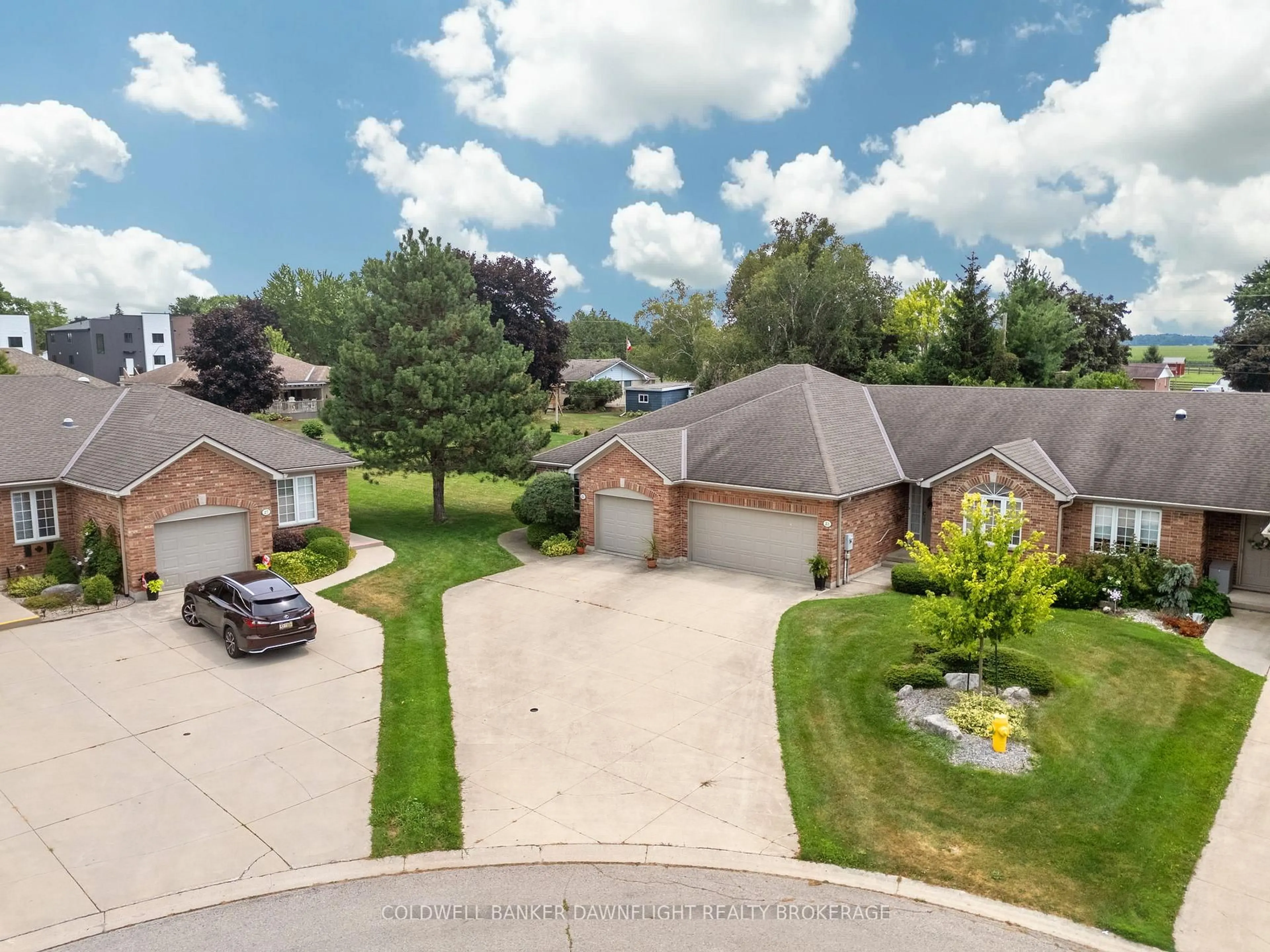 A pic from outside/outdoor area/front of a property/back of a property/a pic from drone, street for 25 Shadow Lane, South Huron Ontario N0M 1S1